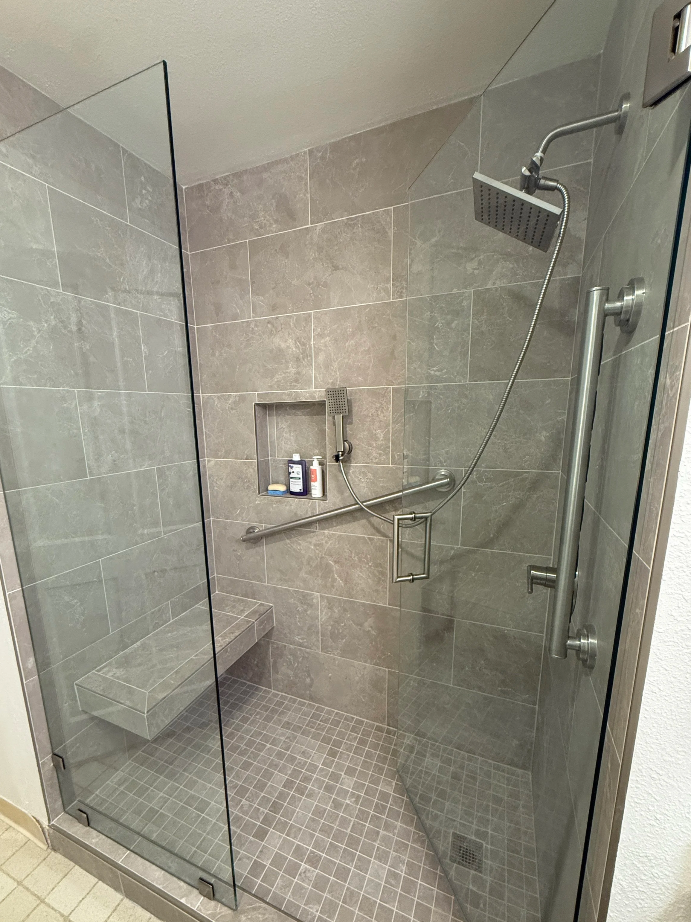 Italian Tile Shower with Frameless Glass and Floating Bench | San Rafael