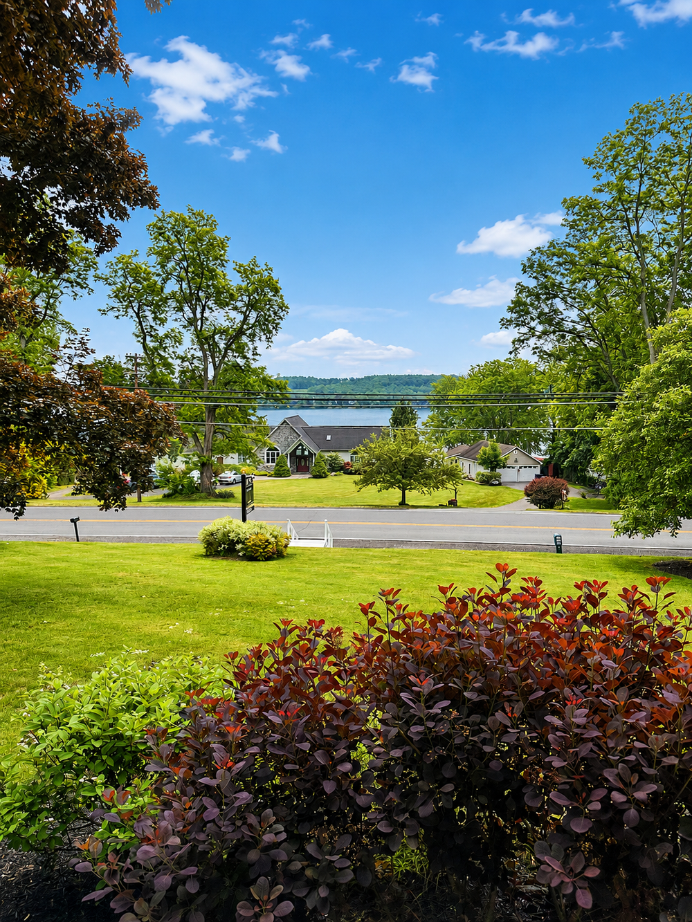 Front deck view overlooking the lawn and Keuka Lake