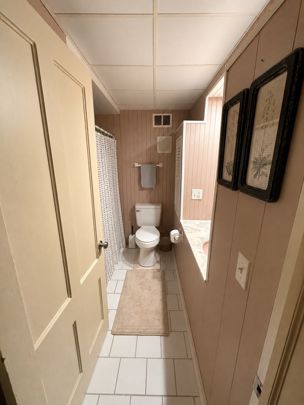 Unit 2 Studio Suite full bathroom view showing the private bathroom layout