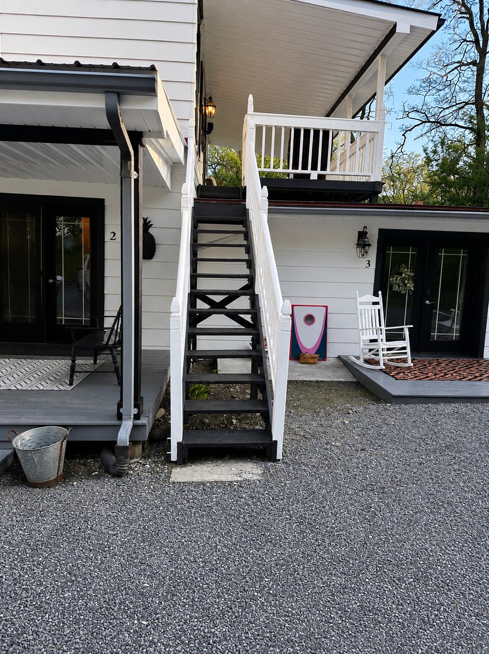 Stairs leading up to the Unit 4 back deck entrance