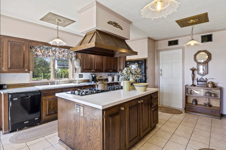 Unit 1 chef’s-style kitchen view 1