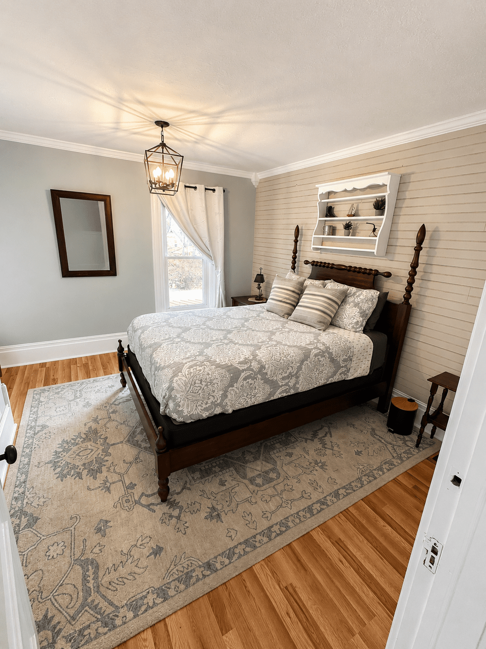 Unit 4 Bedroom 1 with queen bed, nightstand, and classic two-bedroom suite layout