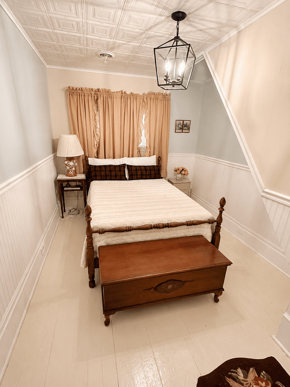 Unit 1 Bedroom 4 with full bed, nightstand, and cozy upstairs layout