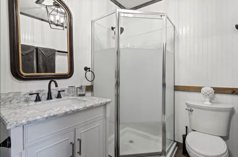 Unit 3 bathroom with shower, vanity, and private bath layout