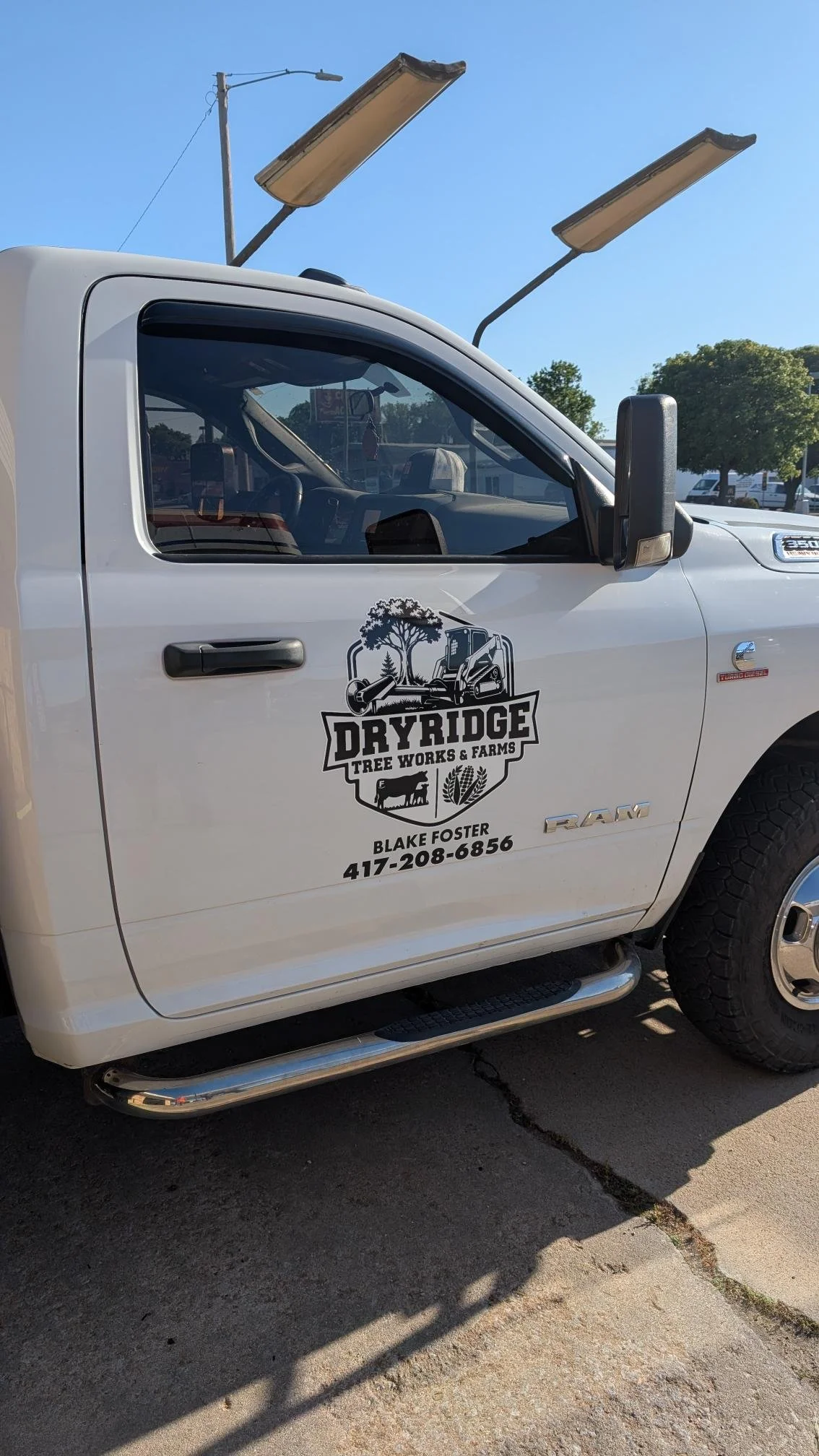 Dry Ridge Tree Works and Farms spot graphic on the side of a truck