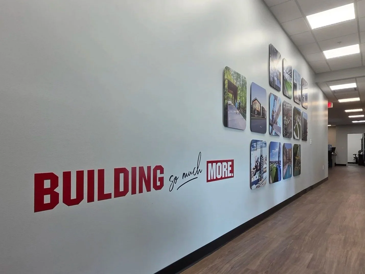 Wall vinyl with hallway sign collage at Crossland - Rogers, AR