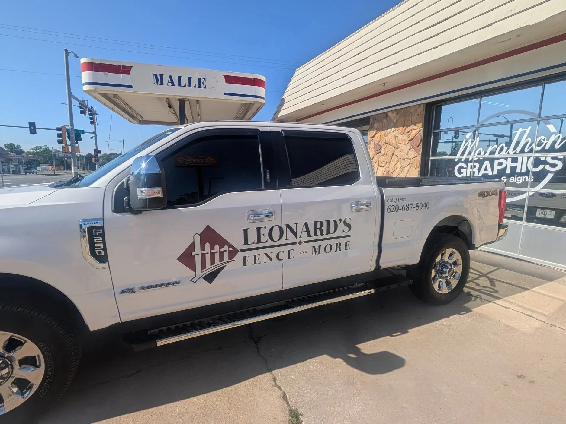 Truck door graphics for Leonard's Fence and More