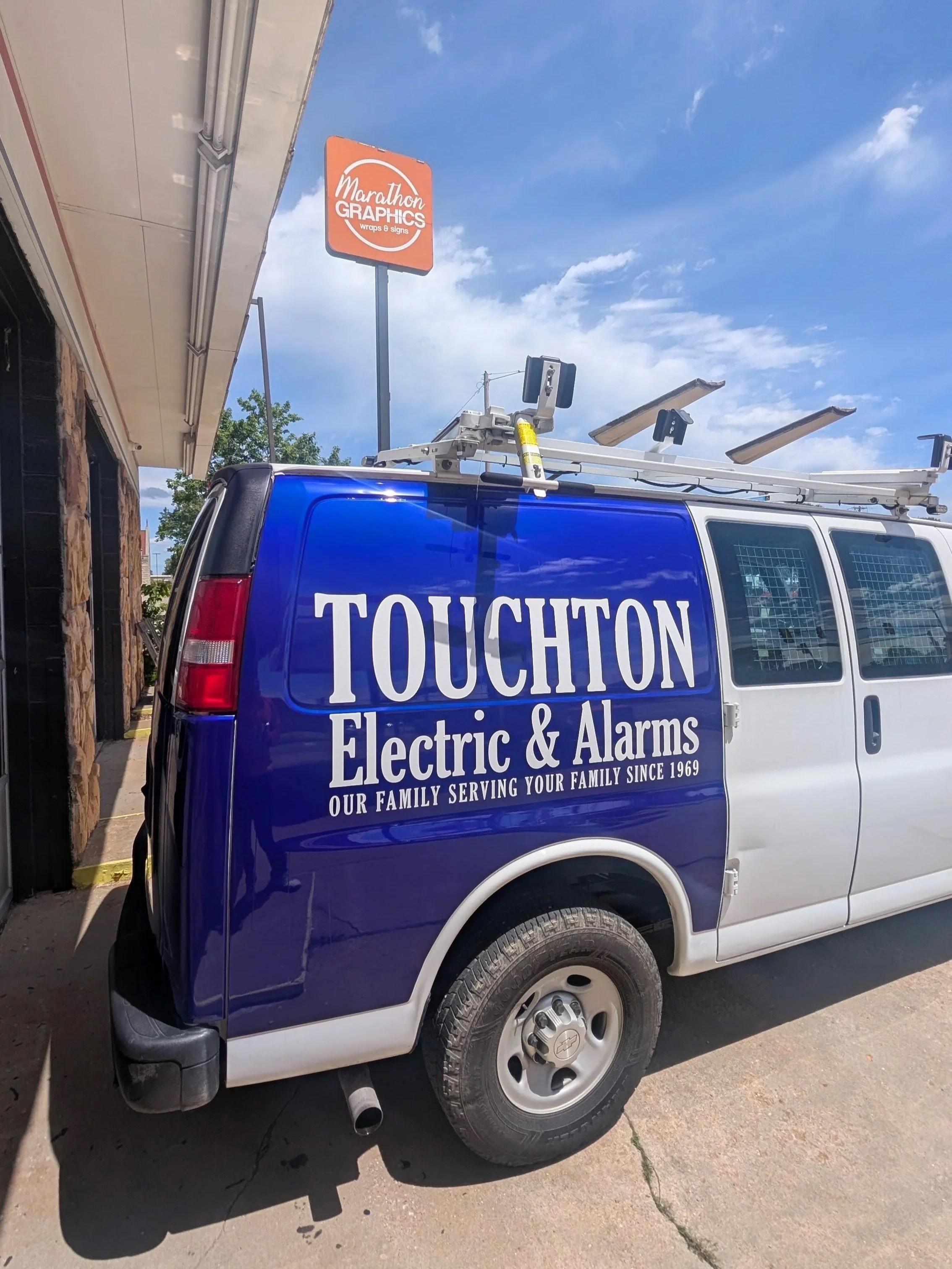 Partial van wrap for Touchton Electric & Alarms