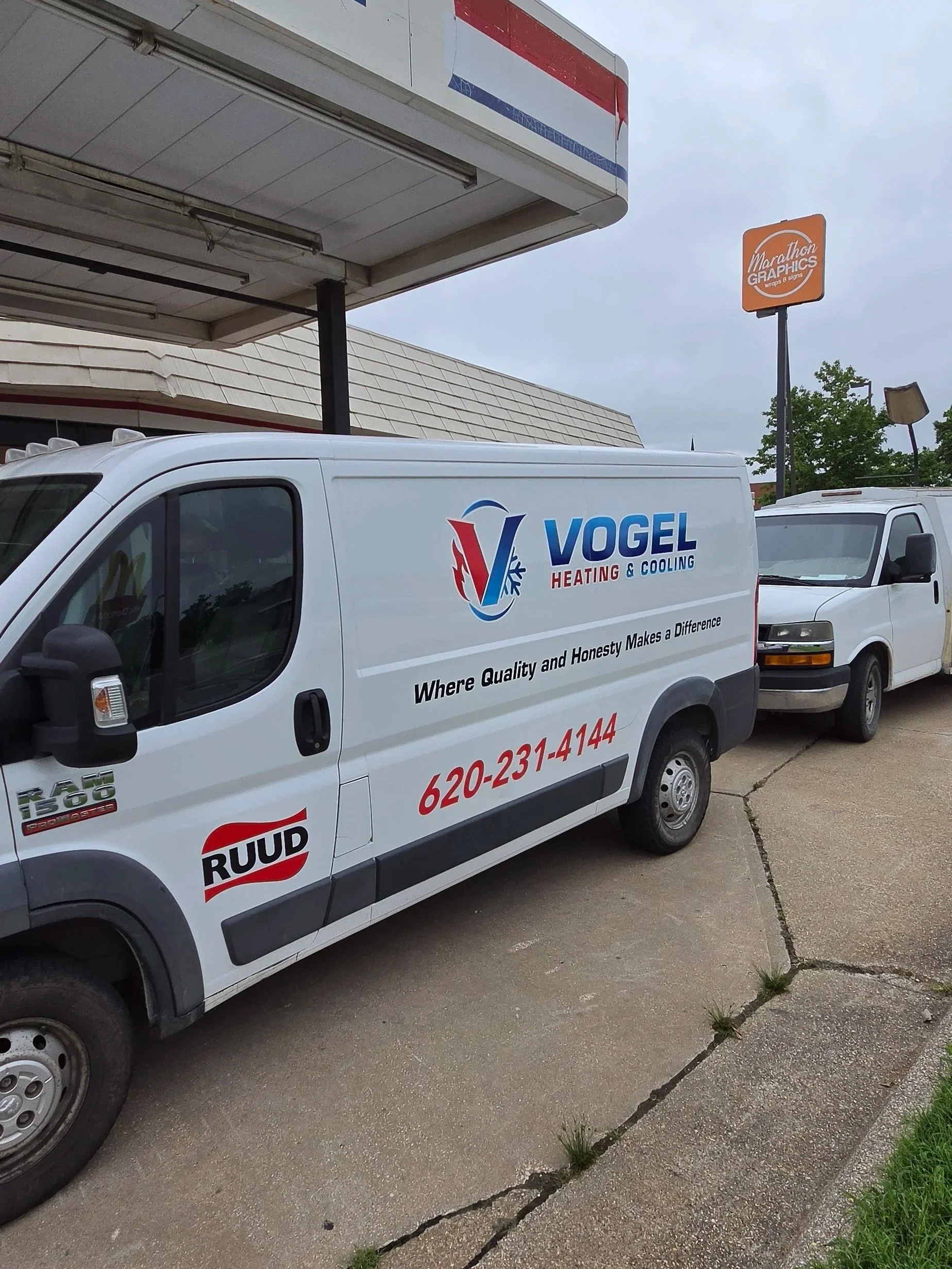Side of promaster van graphics for Vogel Heating & Cooling