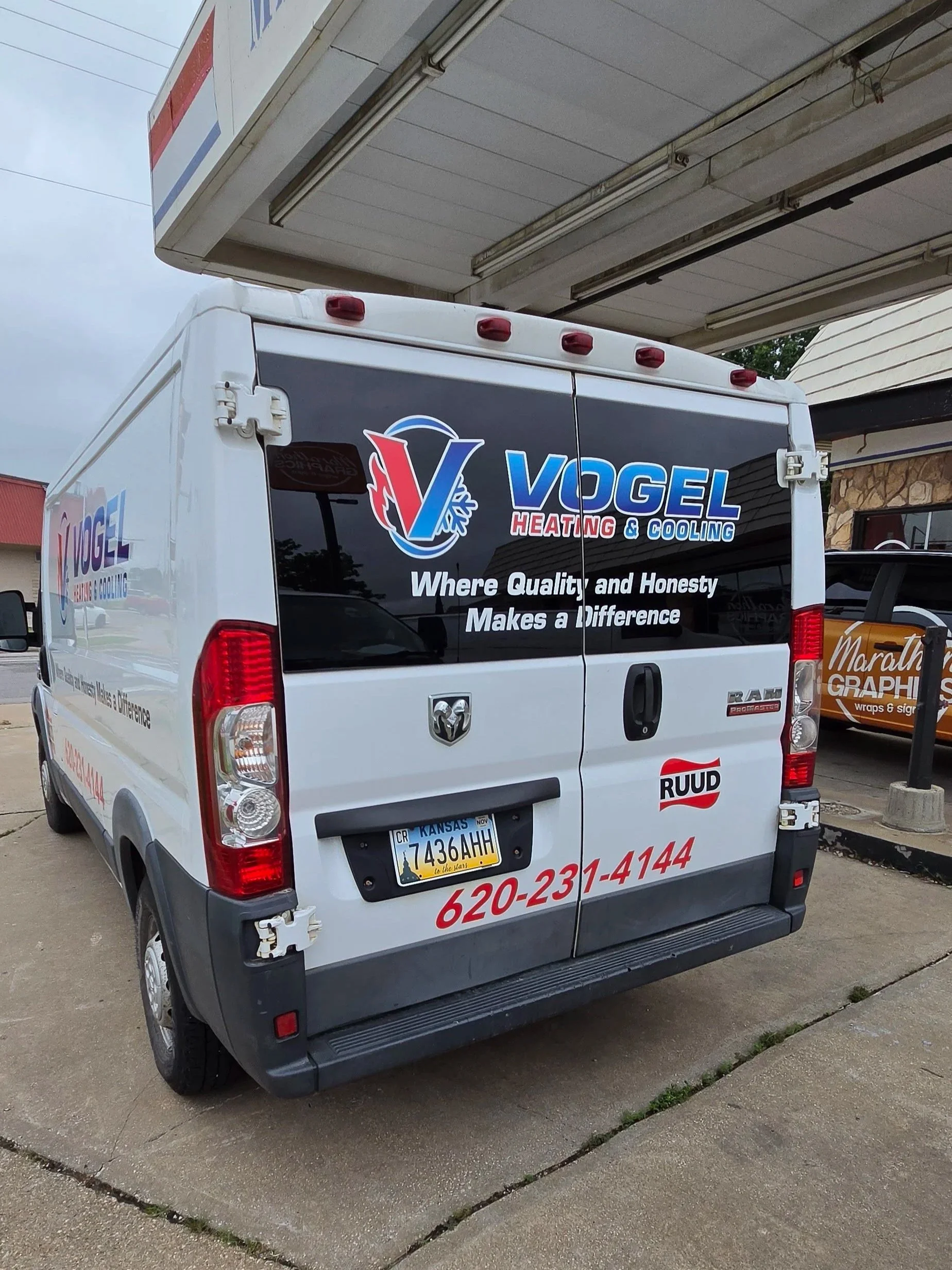 Back of promaster van graphics for Vogel Heating & Cooling