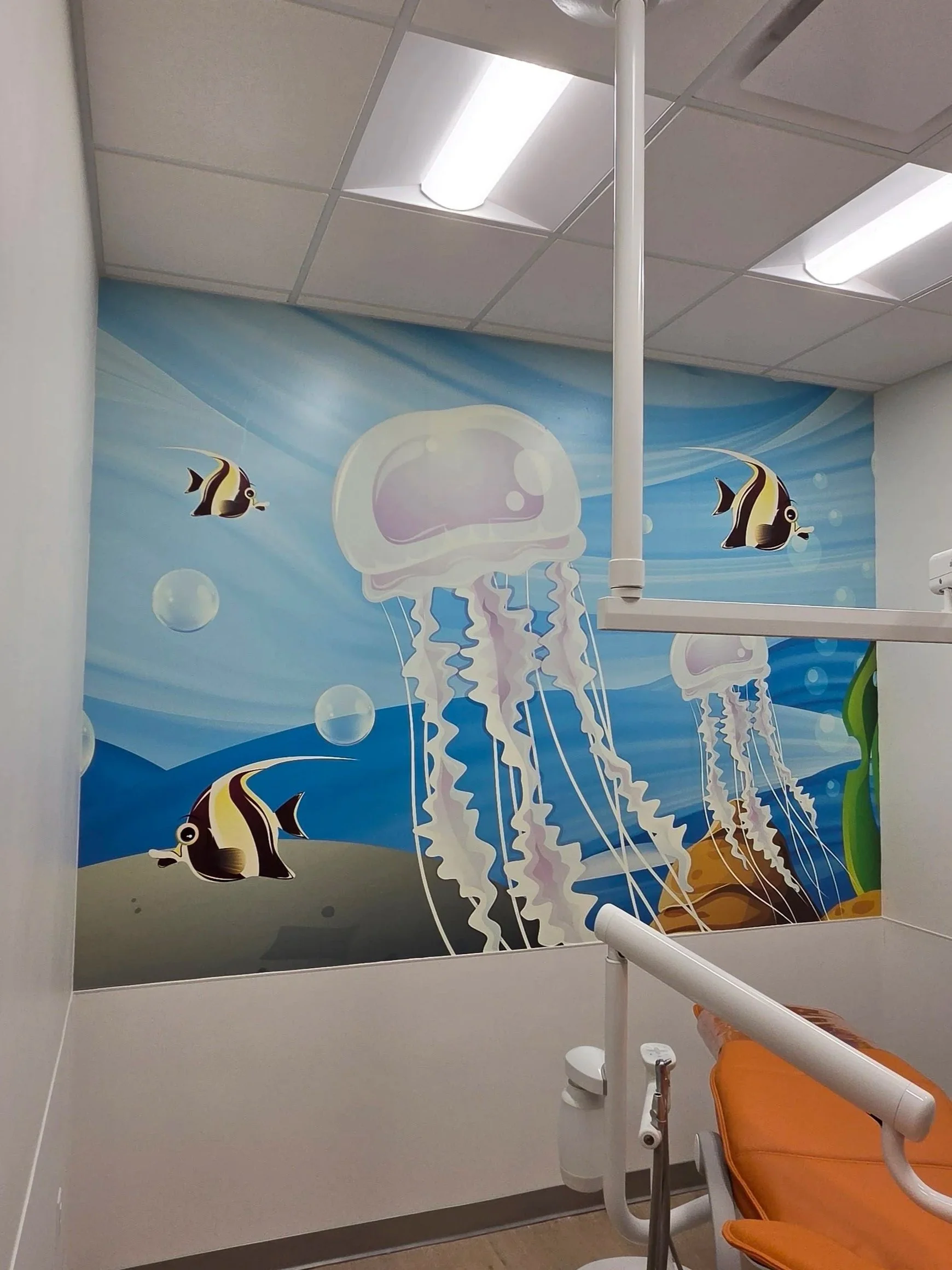 Wall wrap in treatment room at a dentist office