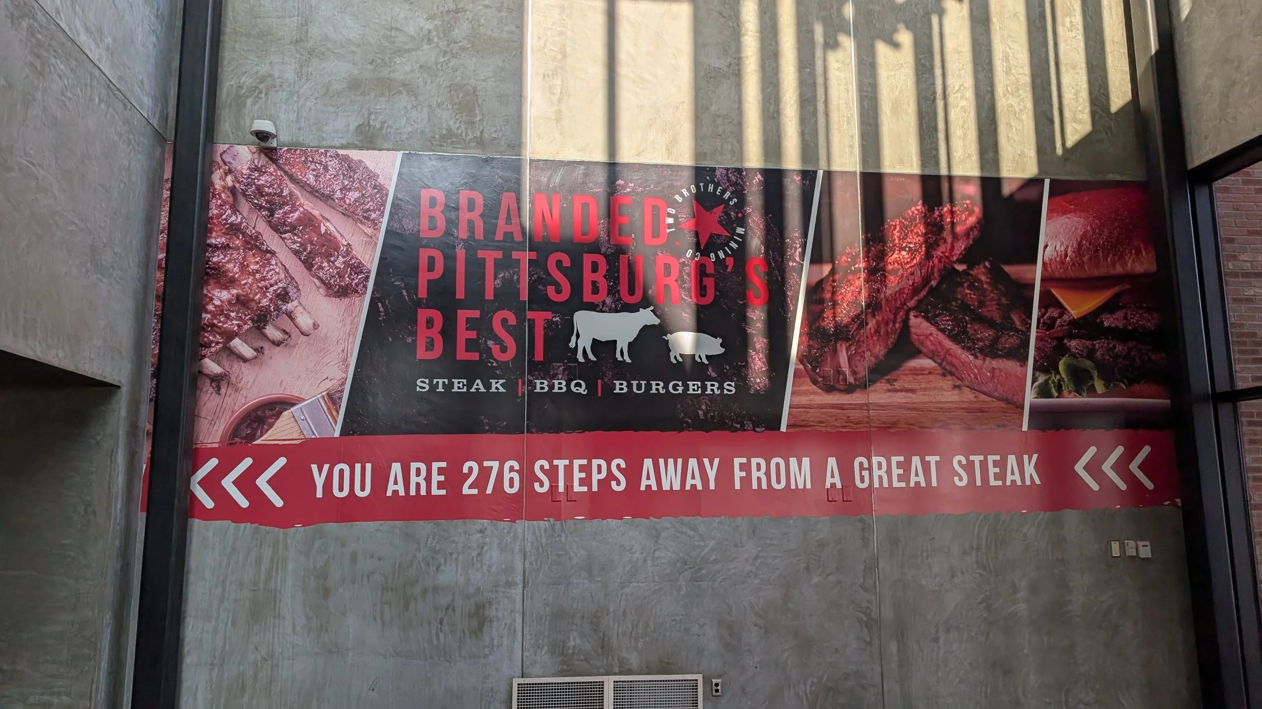 Two Brothers Mining Co. design and logo on a sign