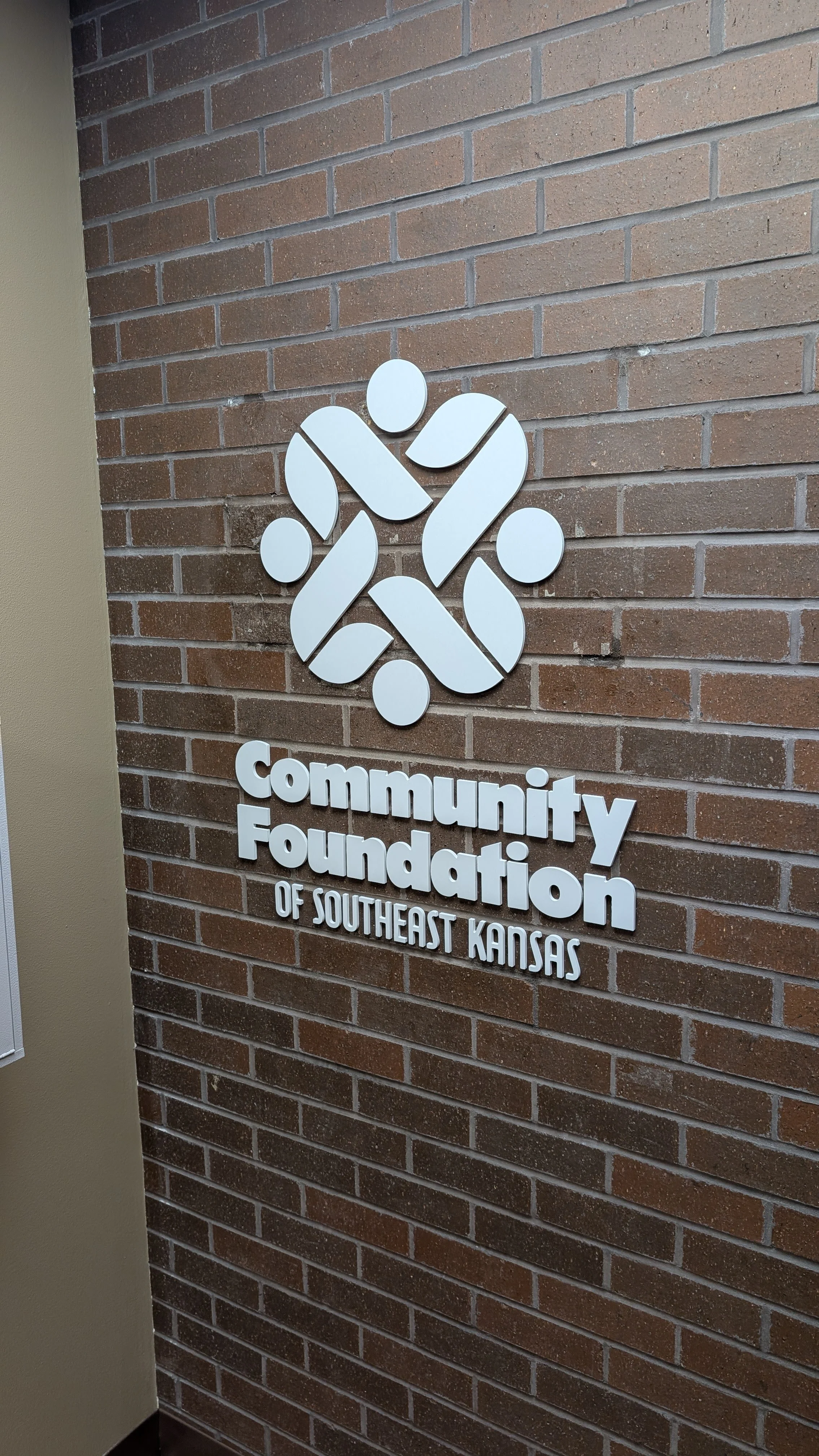 Communication Foundation sign white