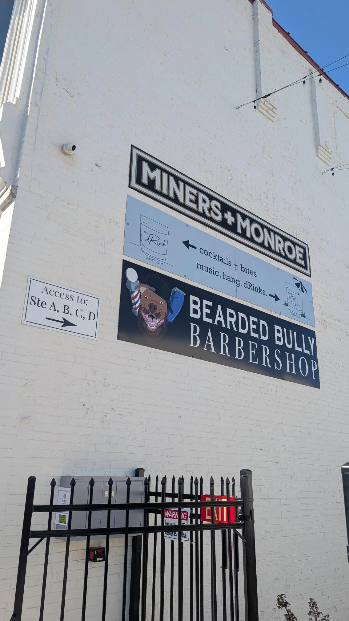 dRink logo design sign on a wall