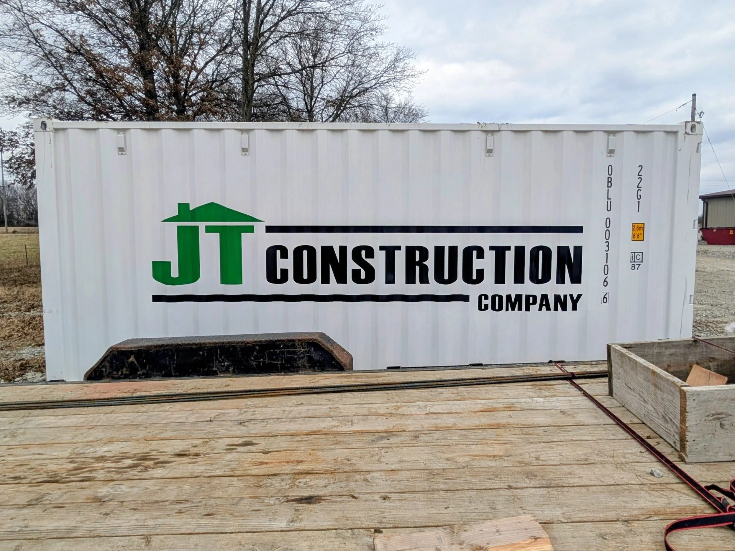 JT Construction container unit spot graphic