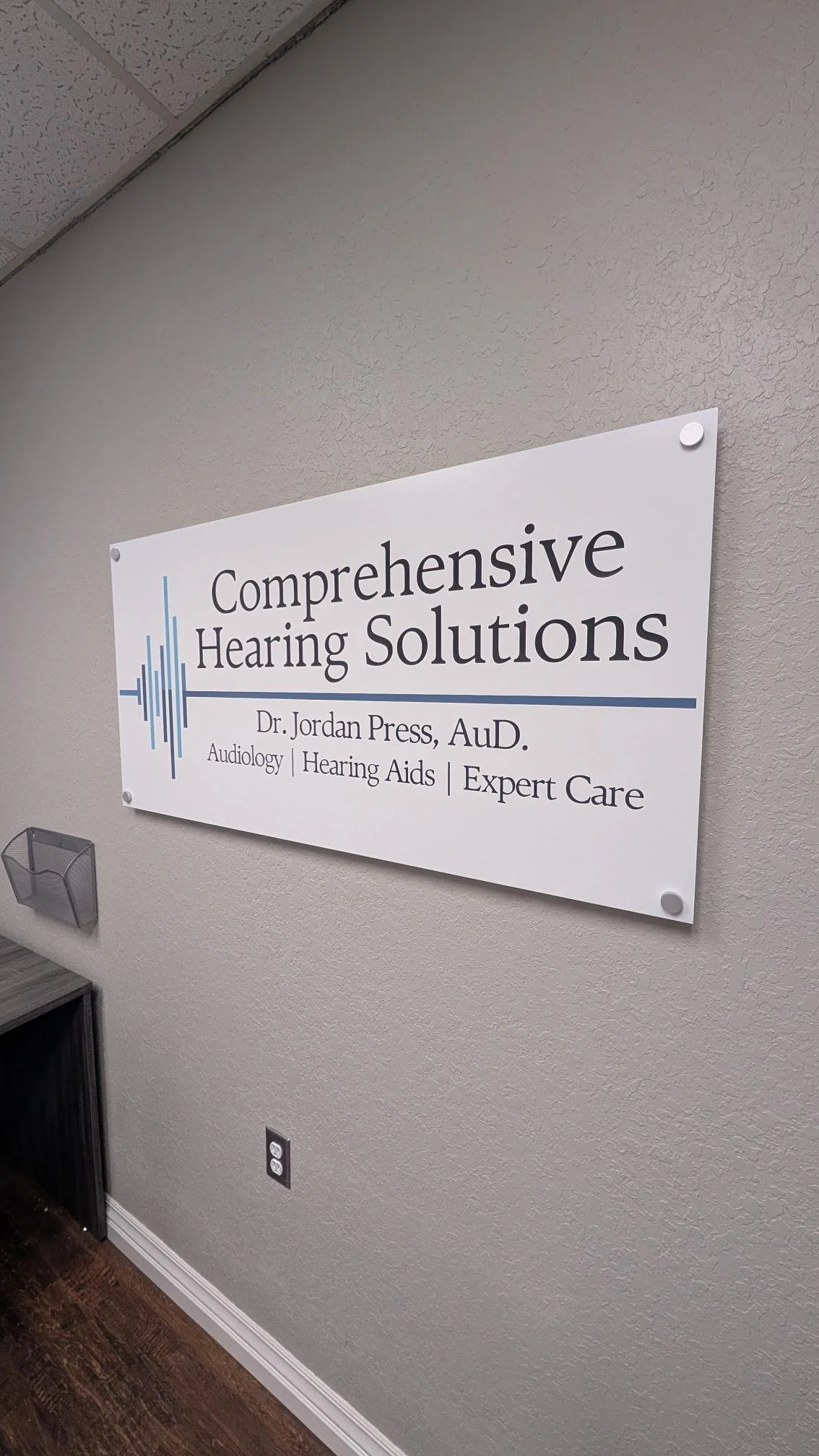 Comprehensive Hearing Solutions sign graphic