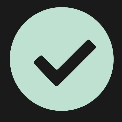 A large black checkmark inside a light blue circle on a black background.