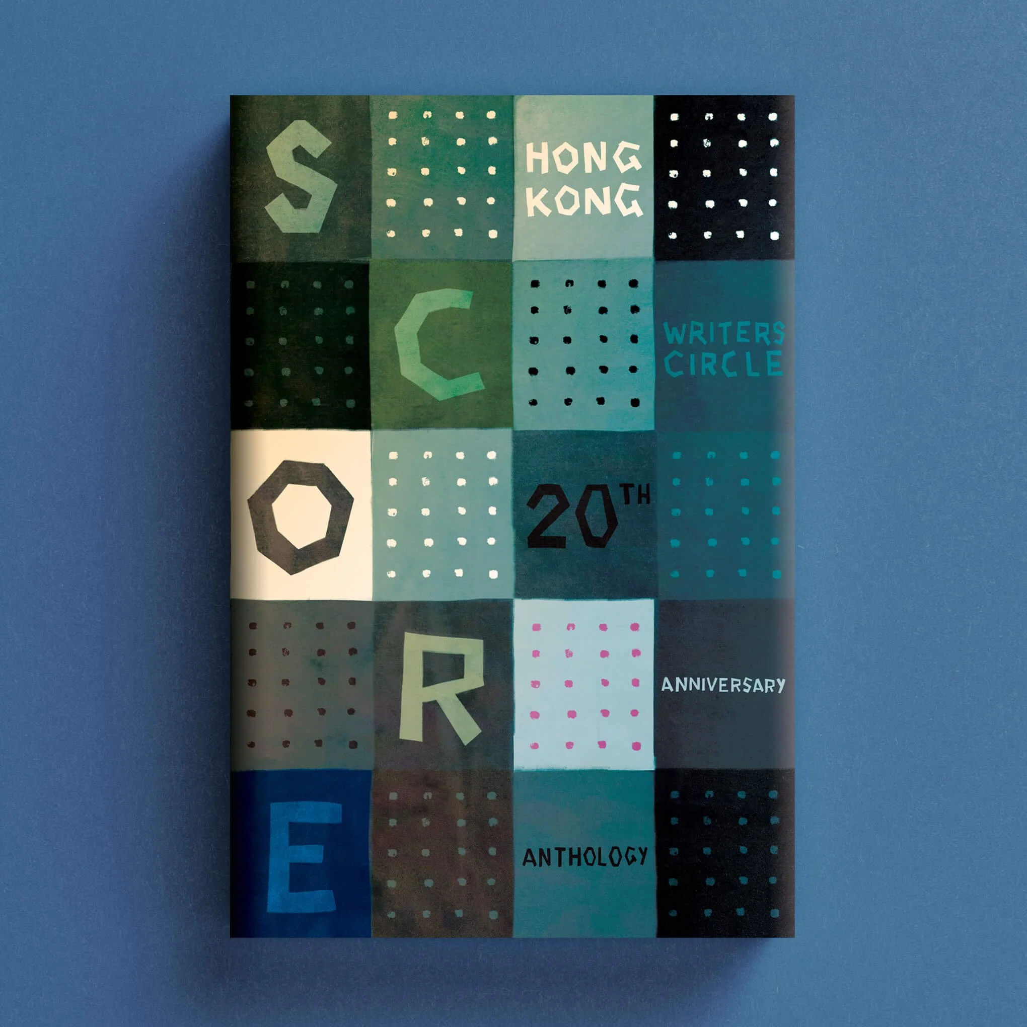Cover for the Hong Kong Writers Circle anthology with a green and teal geometric patchwork grid