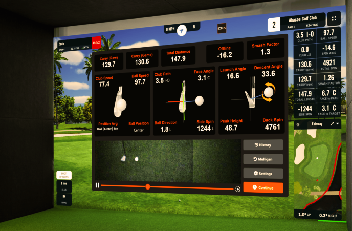 Golf simulator screen displaying swing metrics, golf course map, and options for replay, mulligan, and settings at Abacoa Golf Club.
