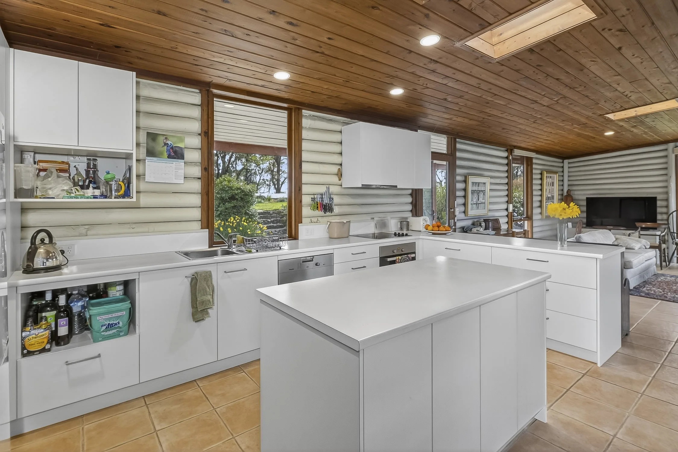 Rustic kitchen in an timber lodge-style house in Mt. Tomah. 