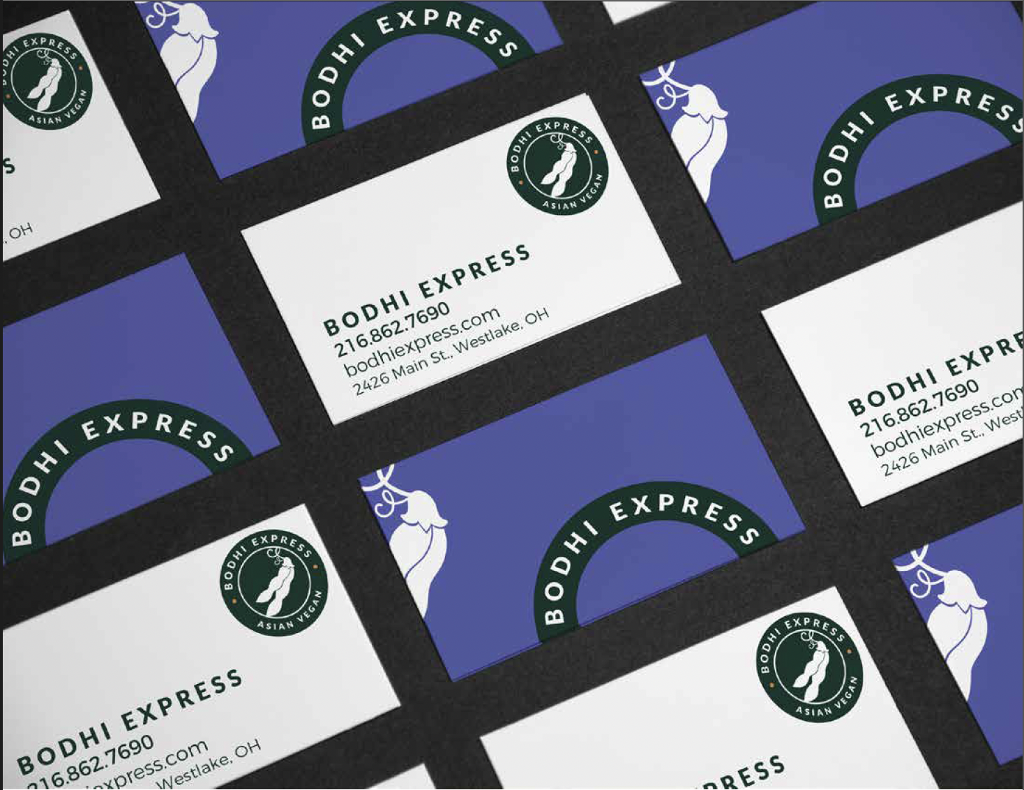 Close-up of multiple business cards for Bodhi Express, a vegan Asian restaurant, arranged in a grid. The cards feature a logo with a white silhouette of a seated figure, green and white color schemes, and contact information.