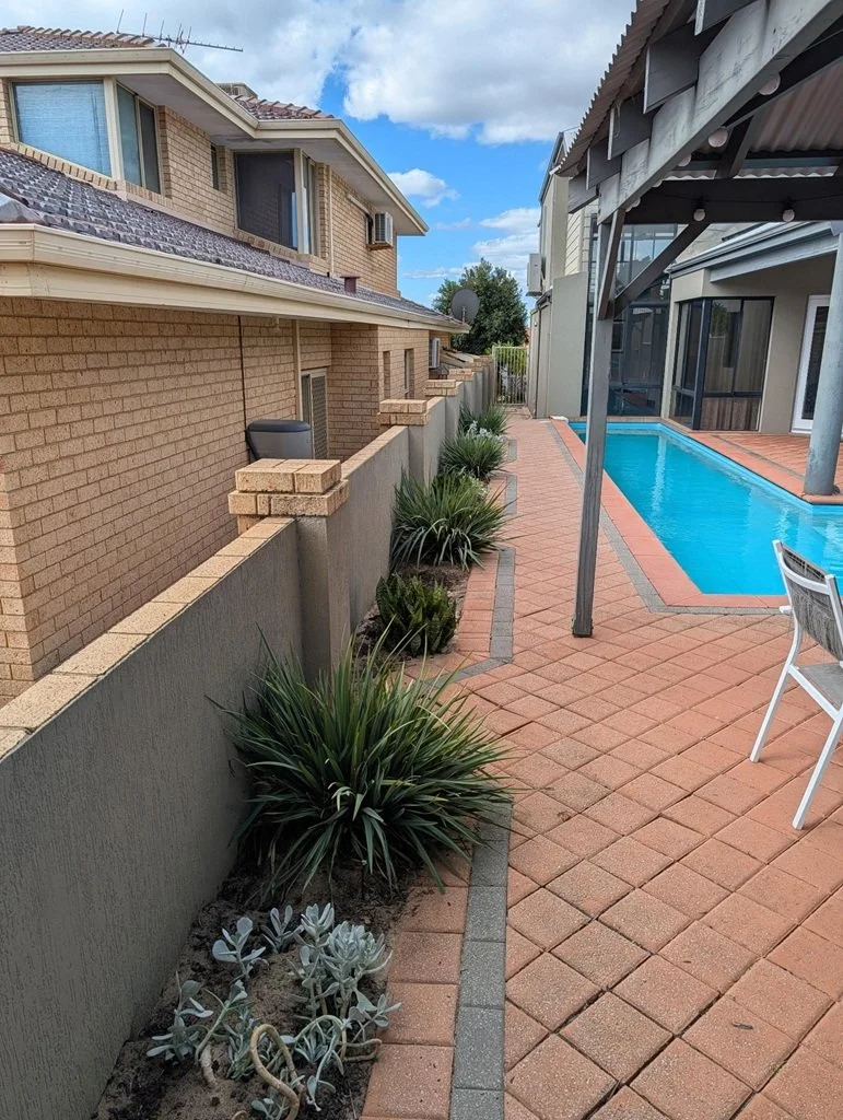 before aluminium slat fence extension brick fence.jpg