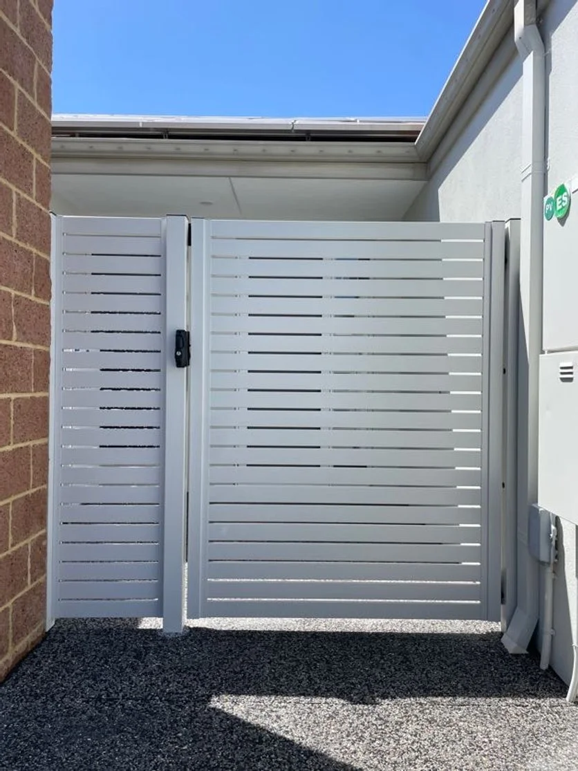 Single aluminium slat front gate with small infill panel, 65mm Surfmist slats, 10mm gaps Clarkson