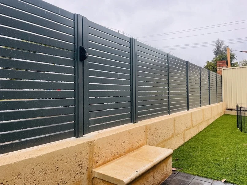 Slat fence - 65mm Woodland grey slats, 10mm gaps in Westminster