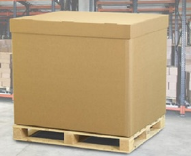 Large cardboard box on a wooden pallet in a warehouse