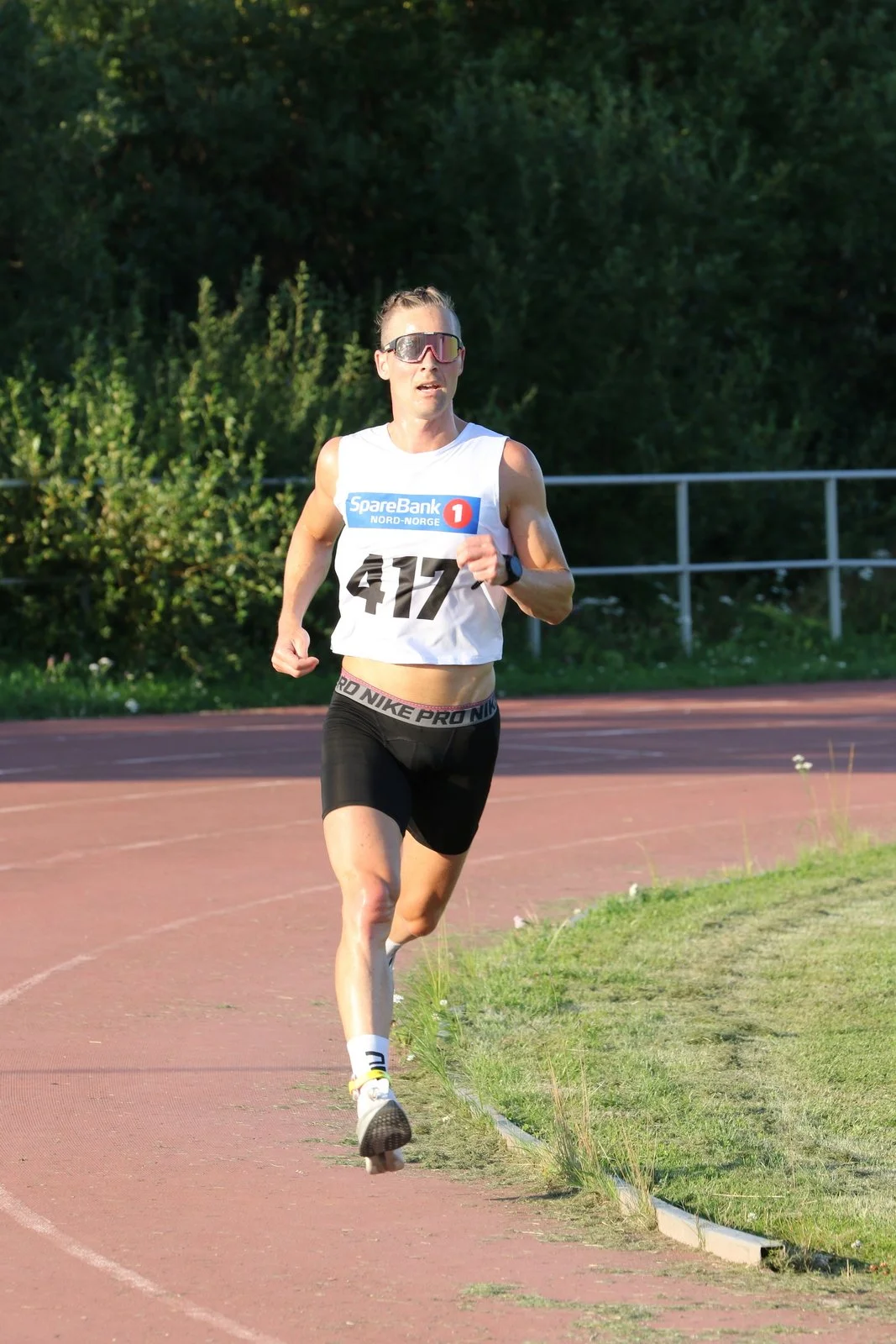 Arctic runner and adventure guide preparing for a private tour in Tromsø’s scenic wilderness.