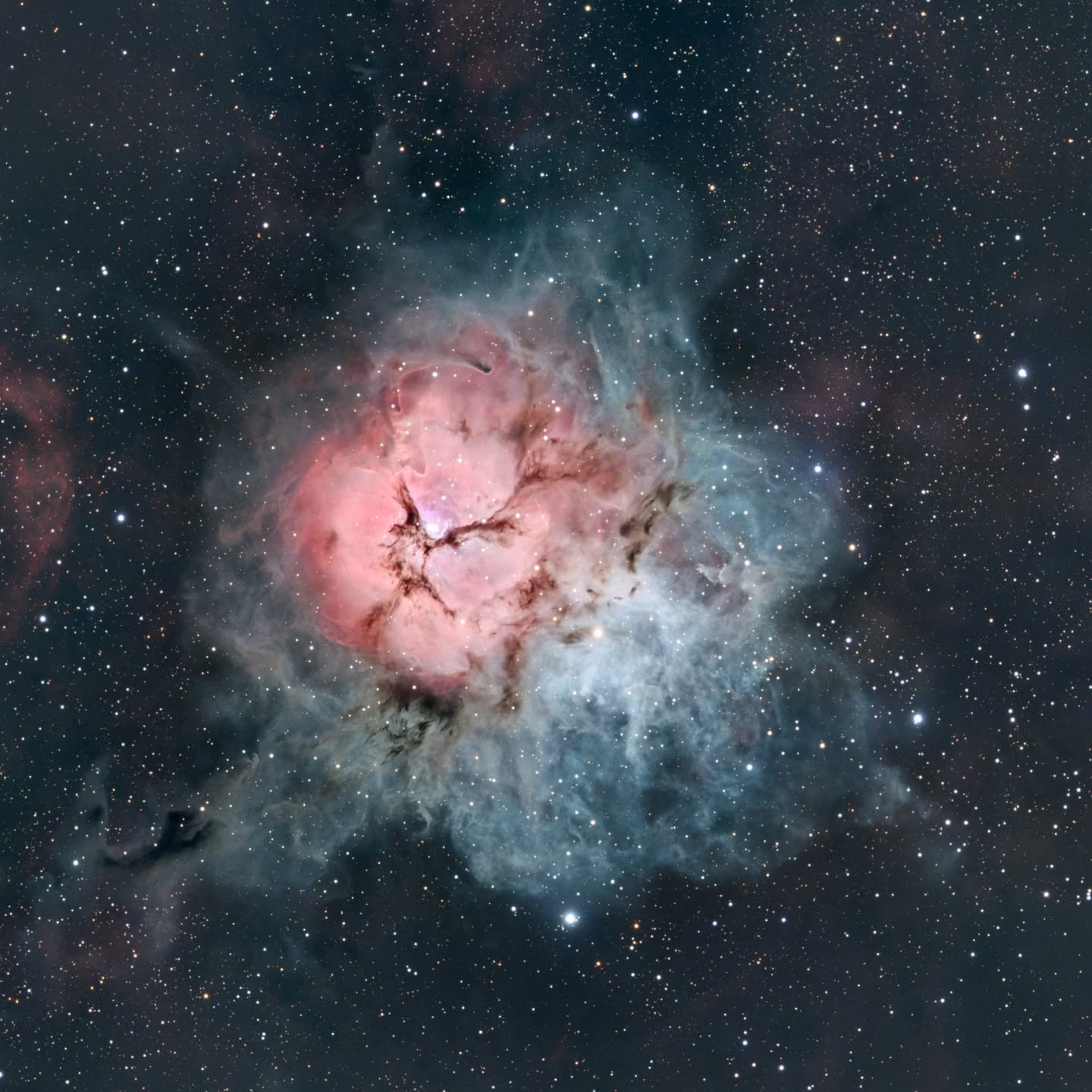 Trifid Triple Digits (100 hours)

I've been waiting to post this photo until I got feedback from the astrophotography competition I submitted it into. This image of the Trifid Nebula was a labour of love, consisting of 100 hours of data captured on 2