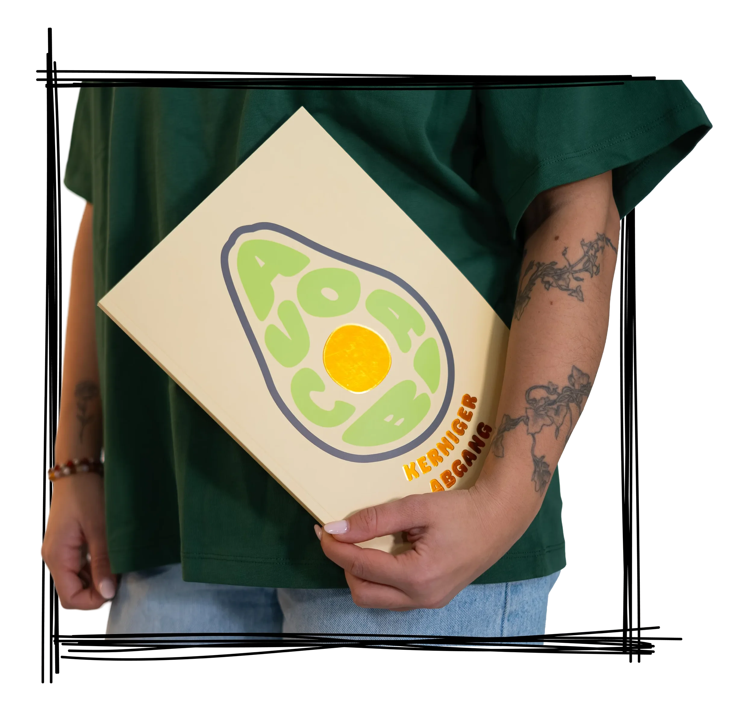 Person hält ein Plakat mit einem Avocado-Design und den Worten 'Kerniger ABgang' in der Hand.