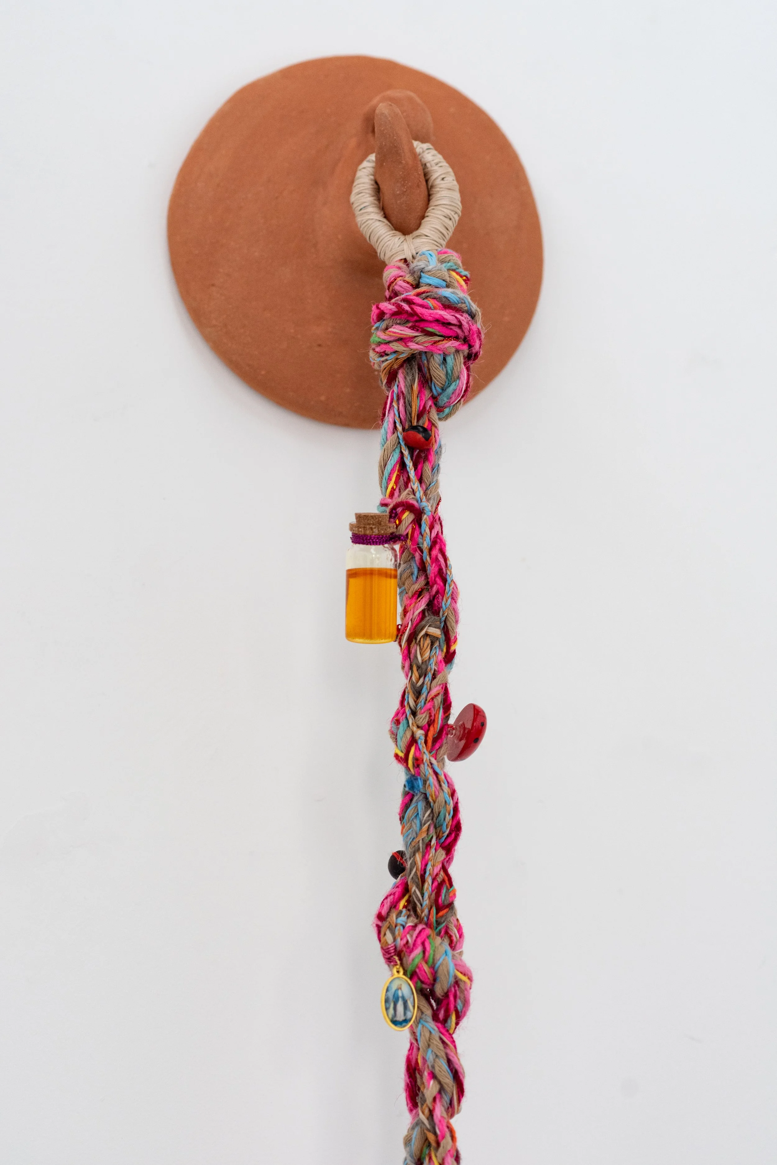 Clay hook, homey jar, lady bug and la Virgen Milagrosa