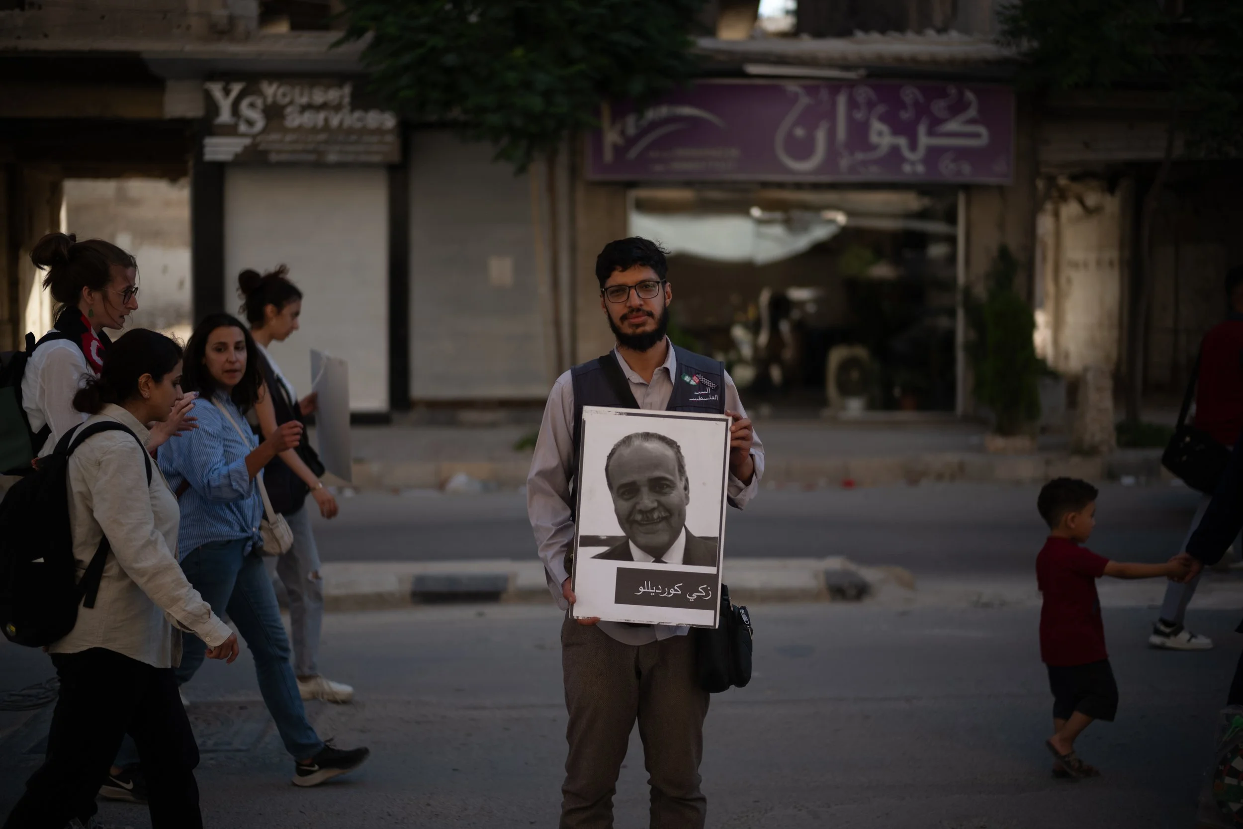 In post Assad Syria, the Tents of Truth allow the families of victims to express themselves about truth and justice. Here in Yarmouk, commonly called Little Palestine, several families have gathered to speak about this essential pursuit of truth and 