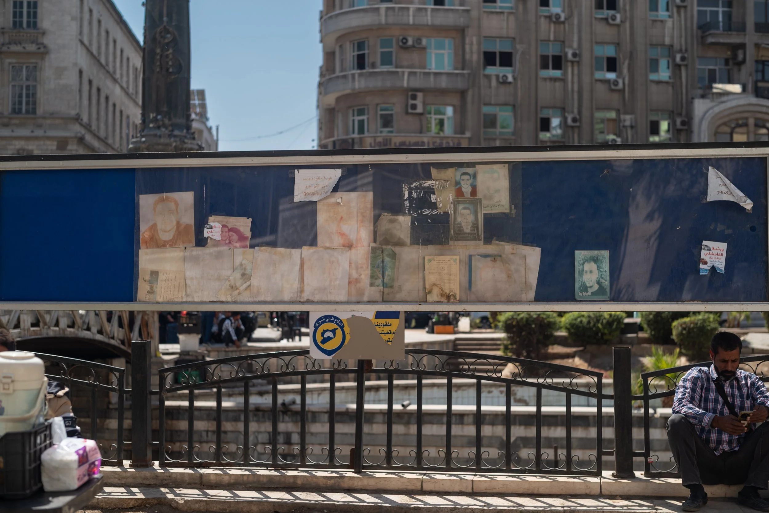 Wall of the Disappeared. Portraits of missing persons are displayed throughout Damascus. Here, at Al Marjeh Square, the photos fade in the sun as families wait tirelessly for the slightest sign of an answer to their hopes. Damascus, Damascus, Syria, 