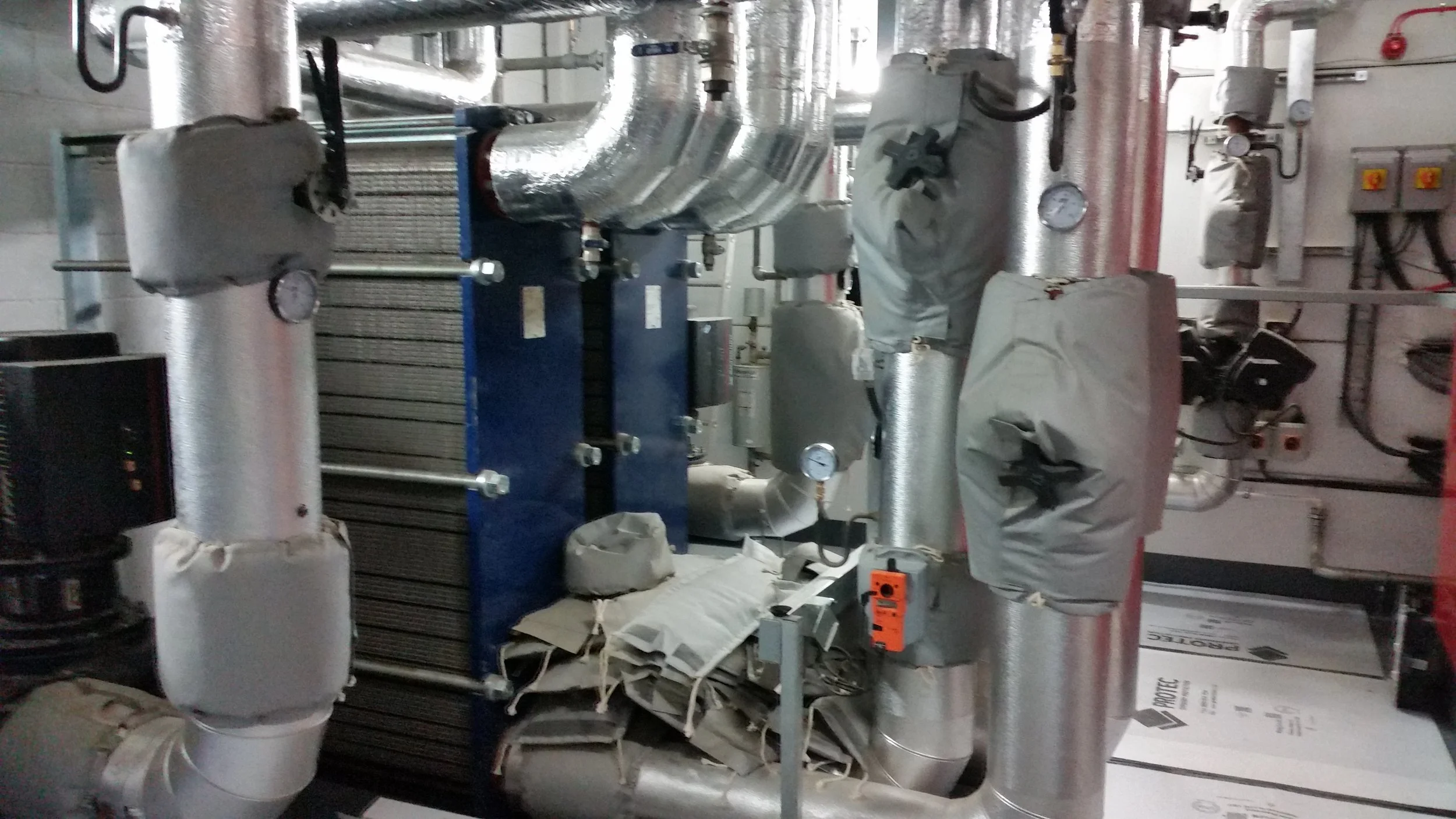 Pipework & Plate Heat Exchangers within a Heating Plantroom
