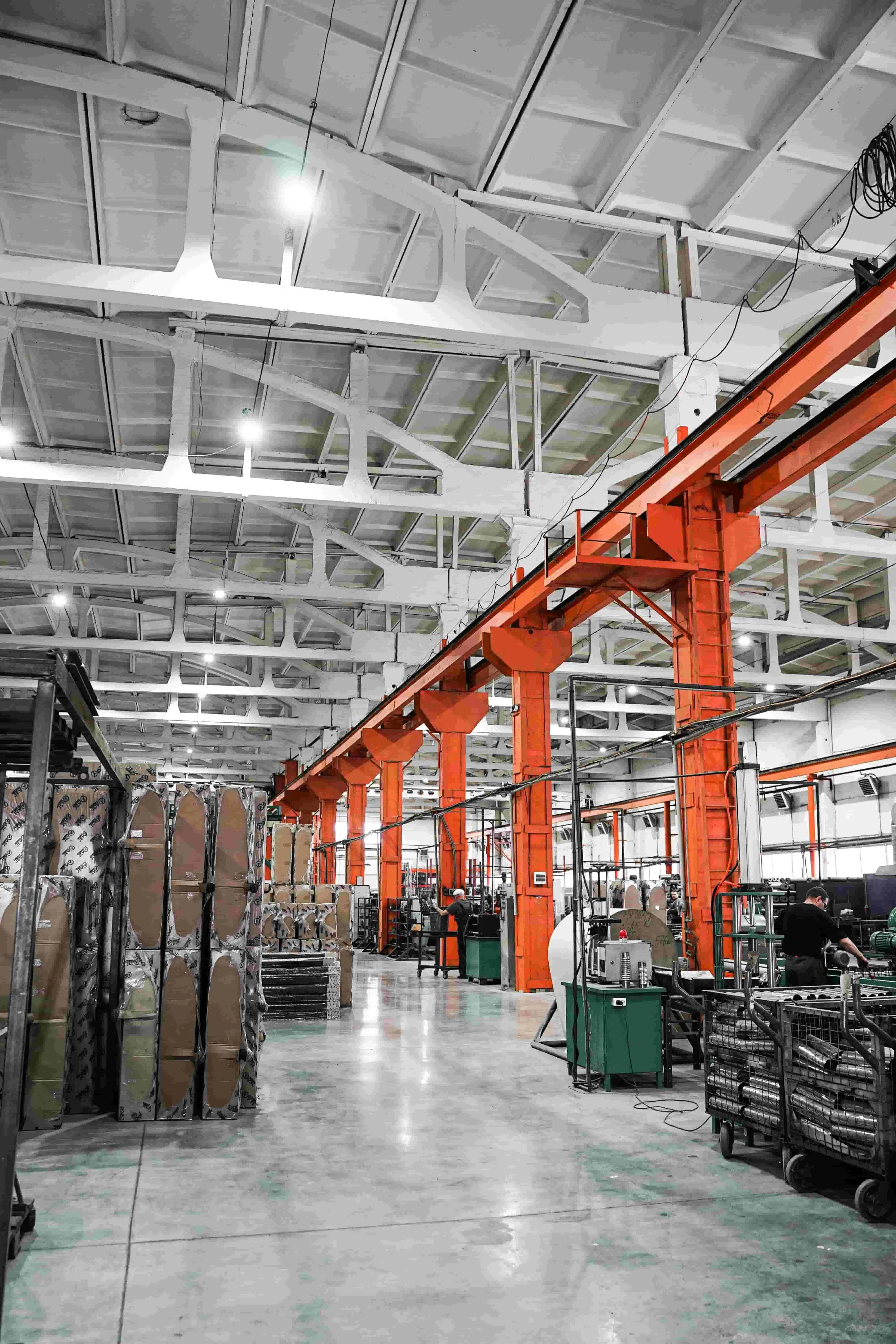 Industrial production facility with process equipment and utility systems