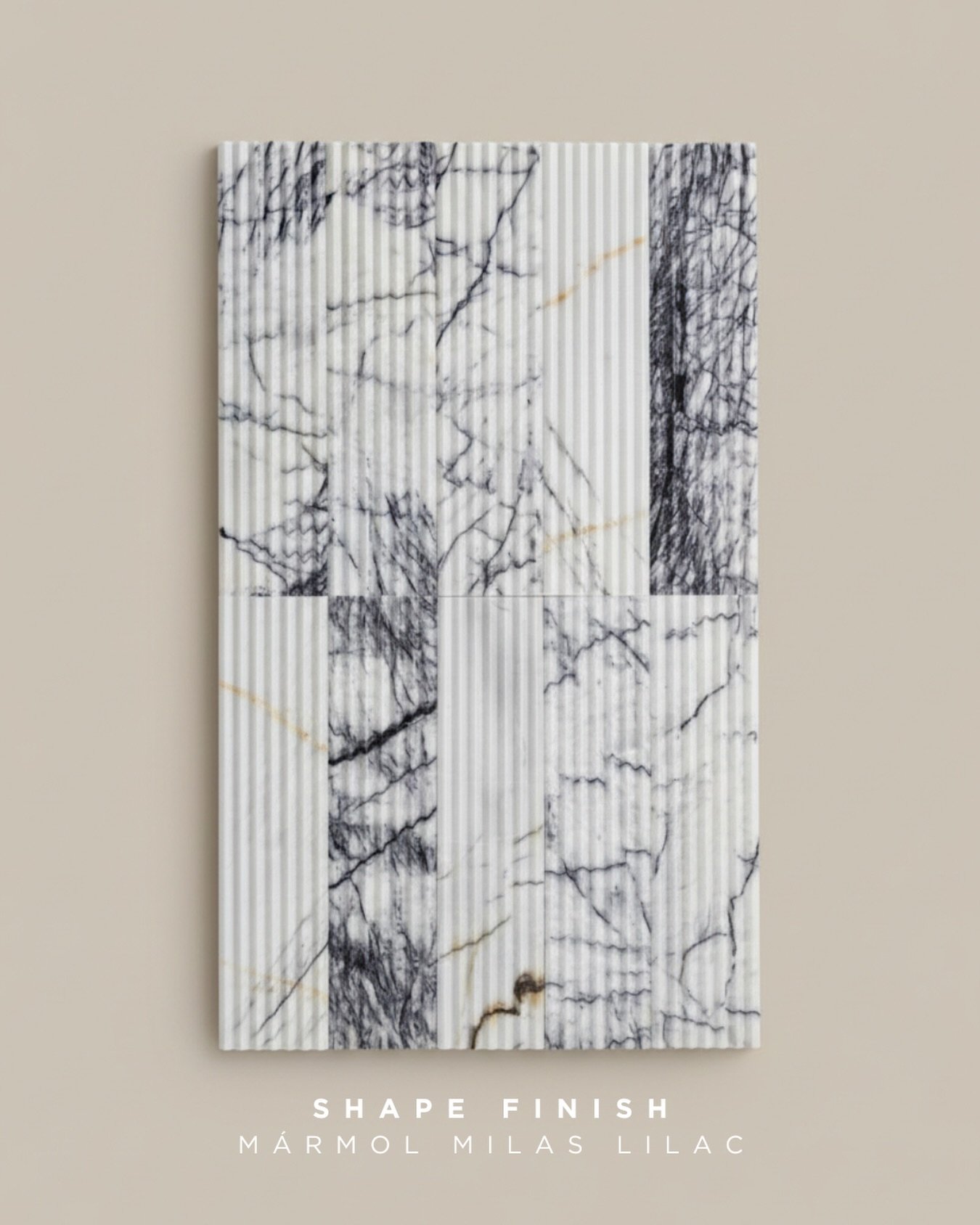 El car&aacute;cter del Milas Lilac se revela en cada veta: trazos intensos, naturales y &uacute;nicos.

Con Shape Finish, el relieve lineal transforma la superficie en un juego de luz y sombra que cambia a lo largo del d&iacute;a.

No es solo un tile