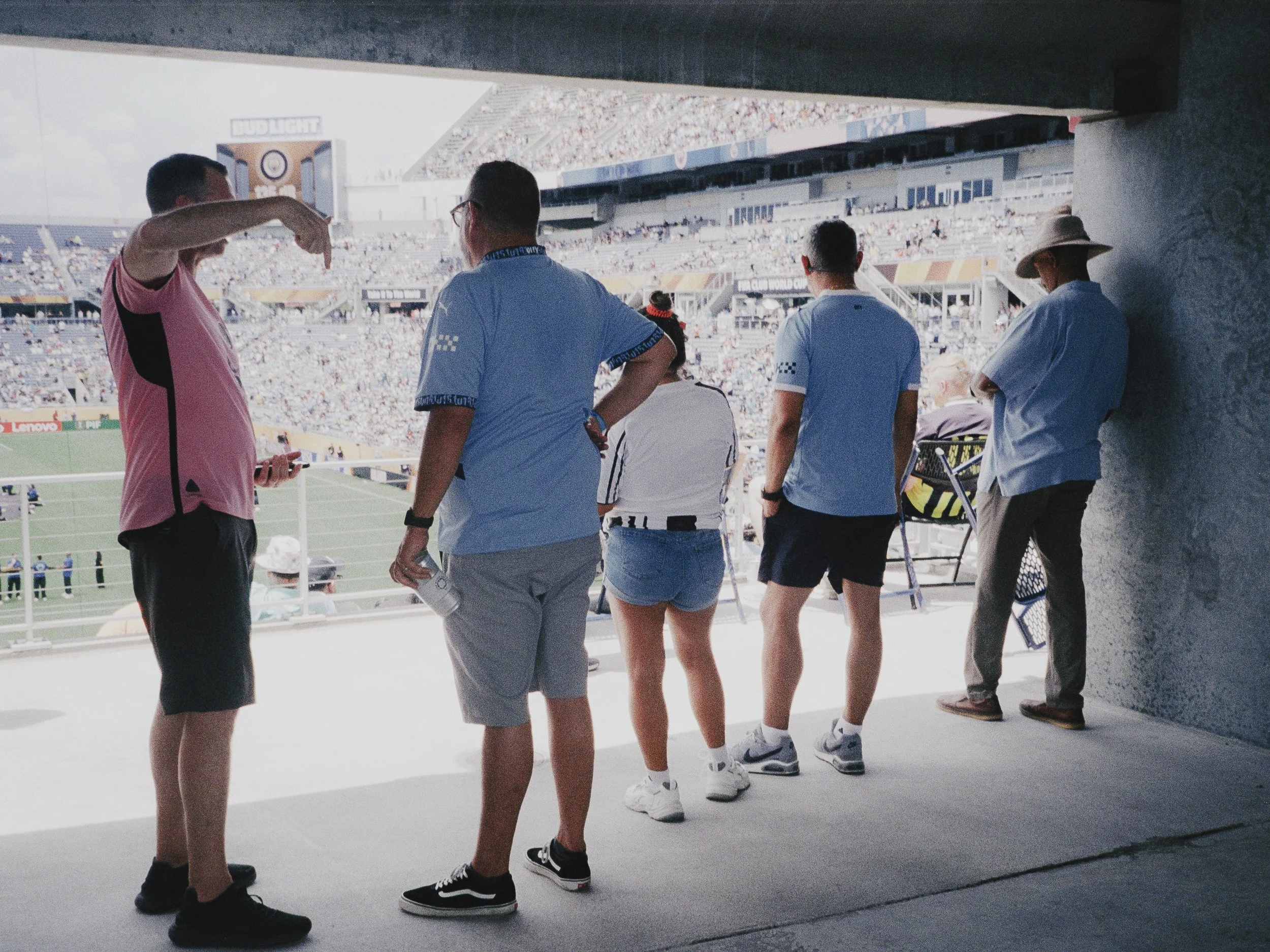 City fans seeking shade pre-match. Camping World Stadium, Orlando, Florida.