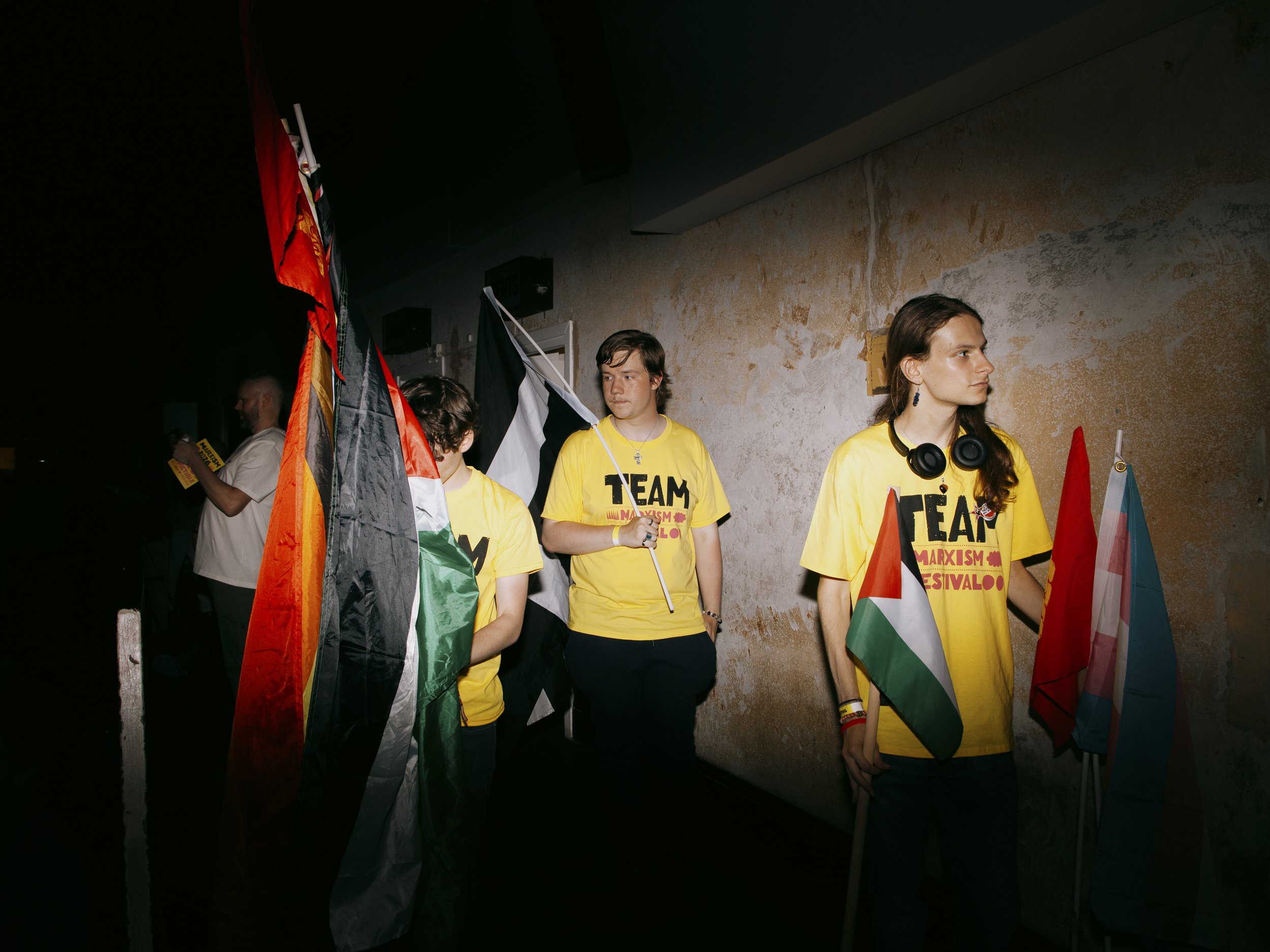 Team Members hand out Flags for Opening Rally. Marxism Festival, London, UK.