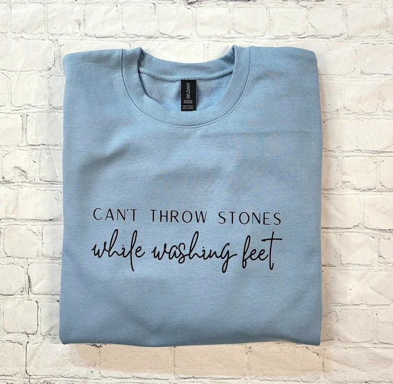 can't throw stones while washing feet stone blue.jpg