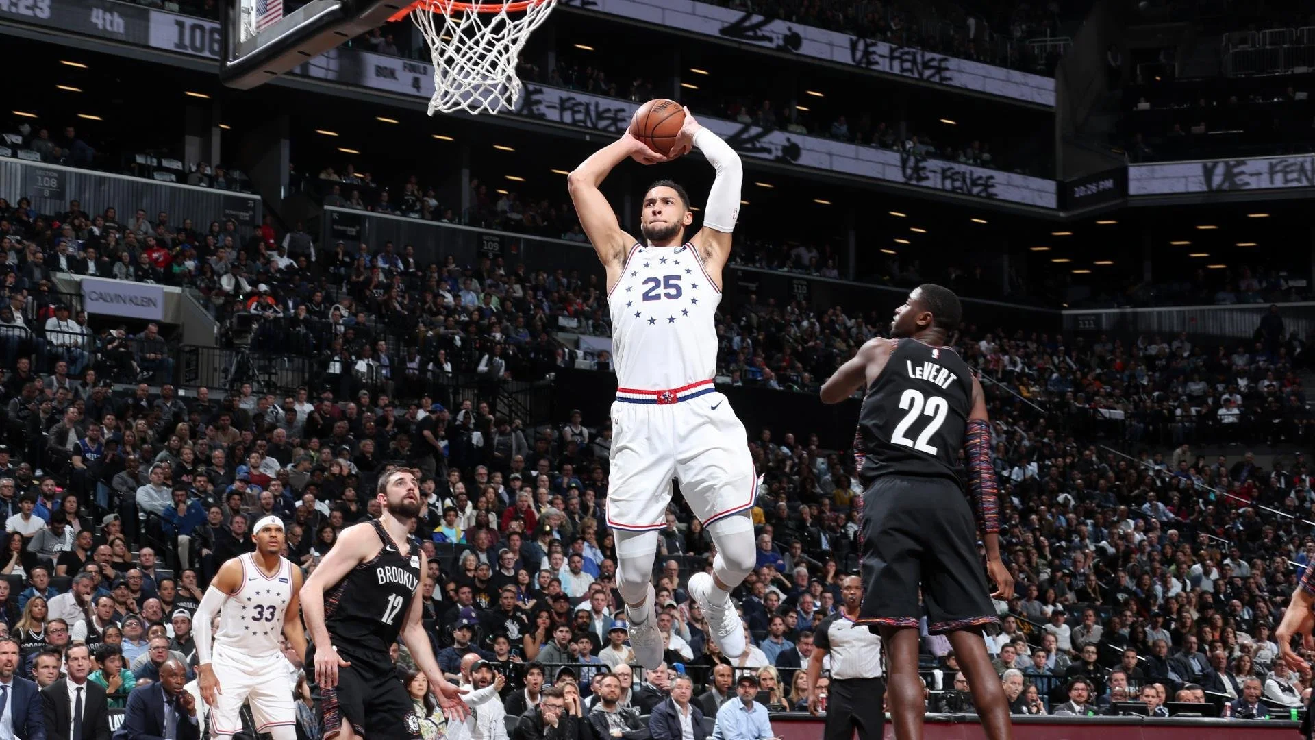 Ben Simmons dunking during a basketball game