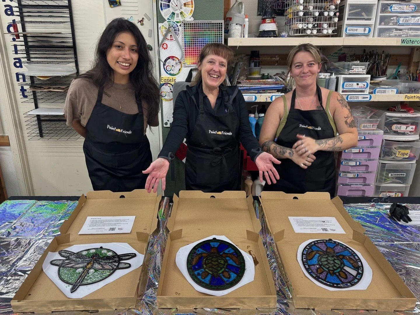 A small, mighty crew and a whole lot of sparkle. 🐢✨

Last Thursday at @radiantcommunityarts we made stained glass suncatchers: a dragonfly glowing over a green moon, and two sea turtles swimming in blues (one went bold with purple, and it totally wo
