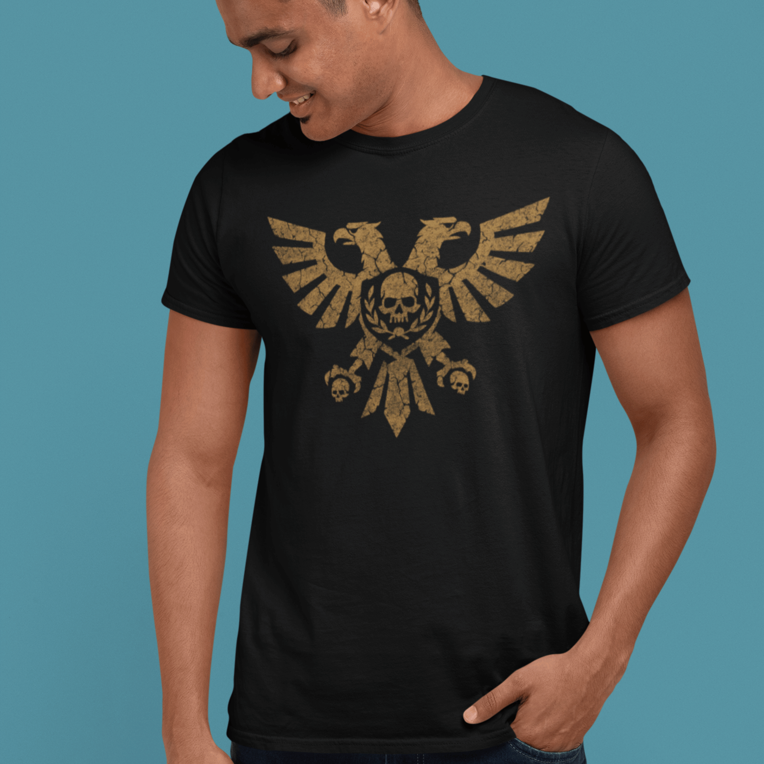 close up of man wearing Warhammer 40k tshirt with gold aquila symbol in gold