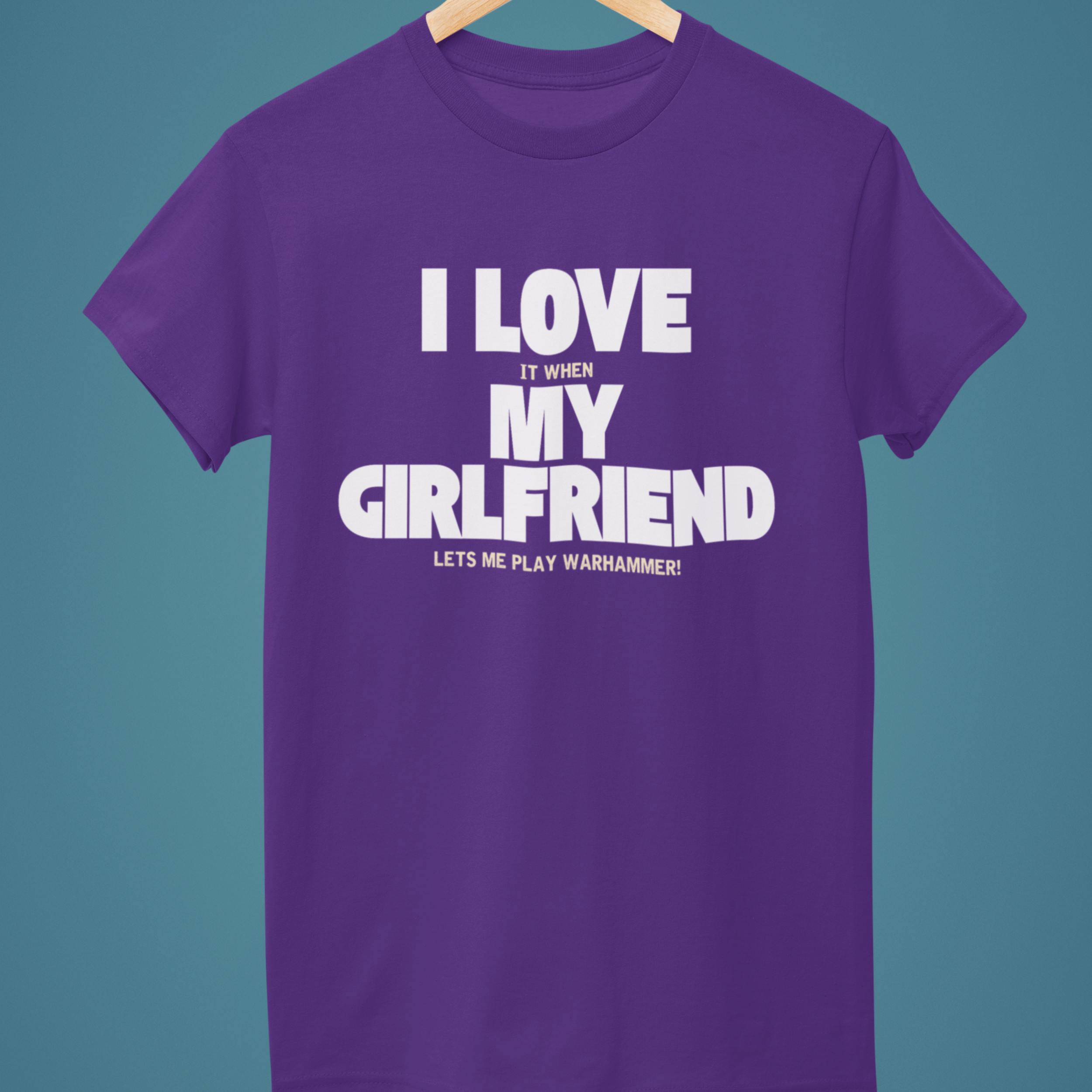 purple Funny warhammer t-shirt for boyfriend with slogan "I love it when my girlfriend lets me play warhammer!"