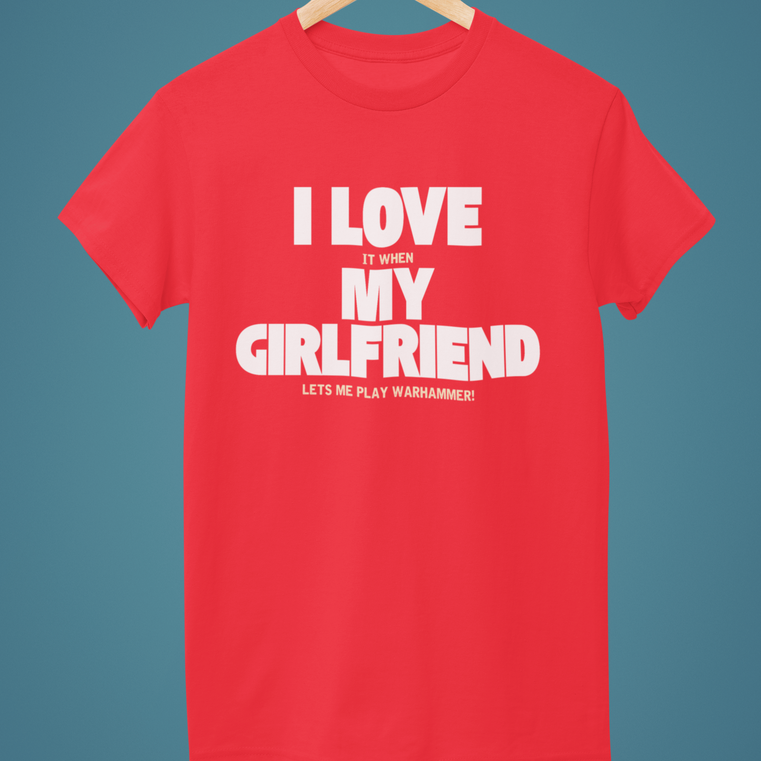 red Funny warhammer t-shirt for boyfriend with slogan "I love it when my girlfriend lets me play warhammer!"