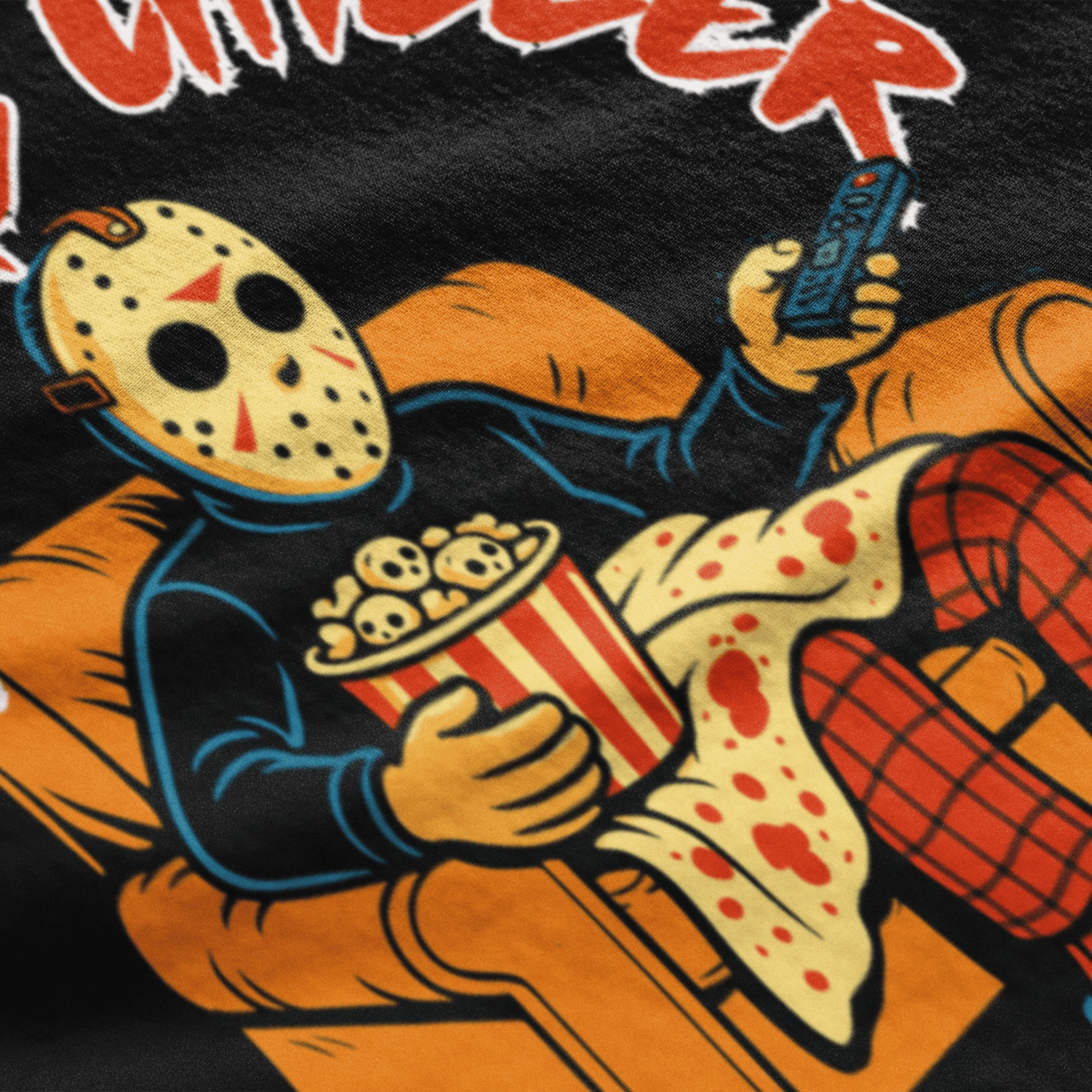 close up of horror movie lover t-shirt with jason vorhees watching slasher movies