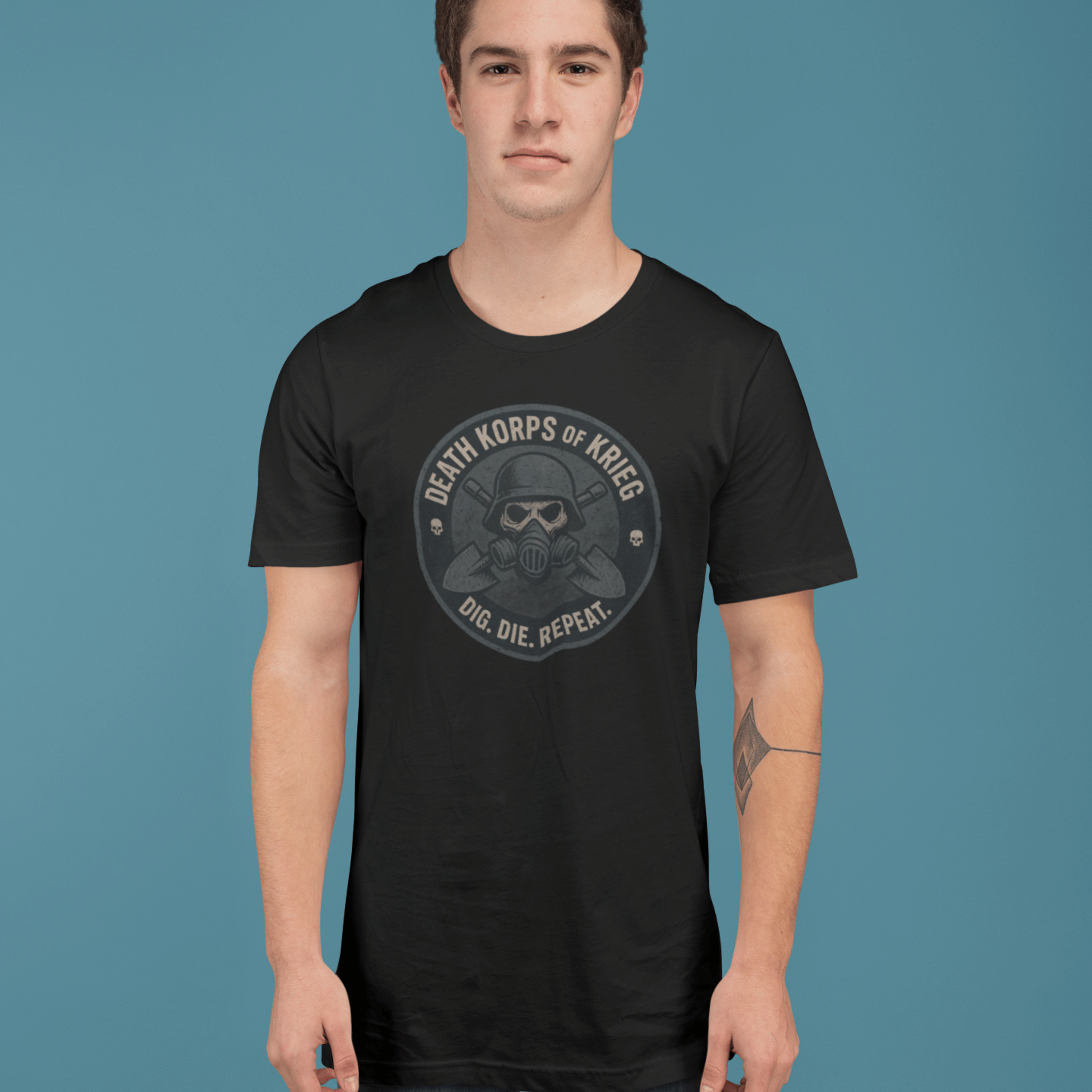 man wearing Warhammer 40k death korps of krieg tshirt with skull and "dig die repeat" slogan