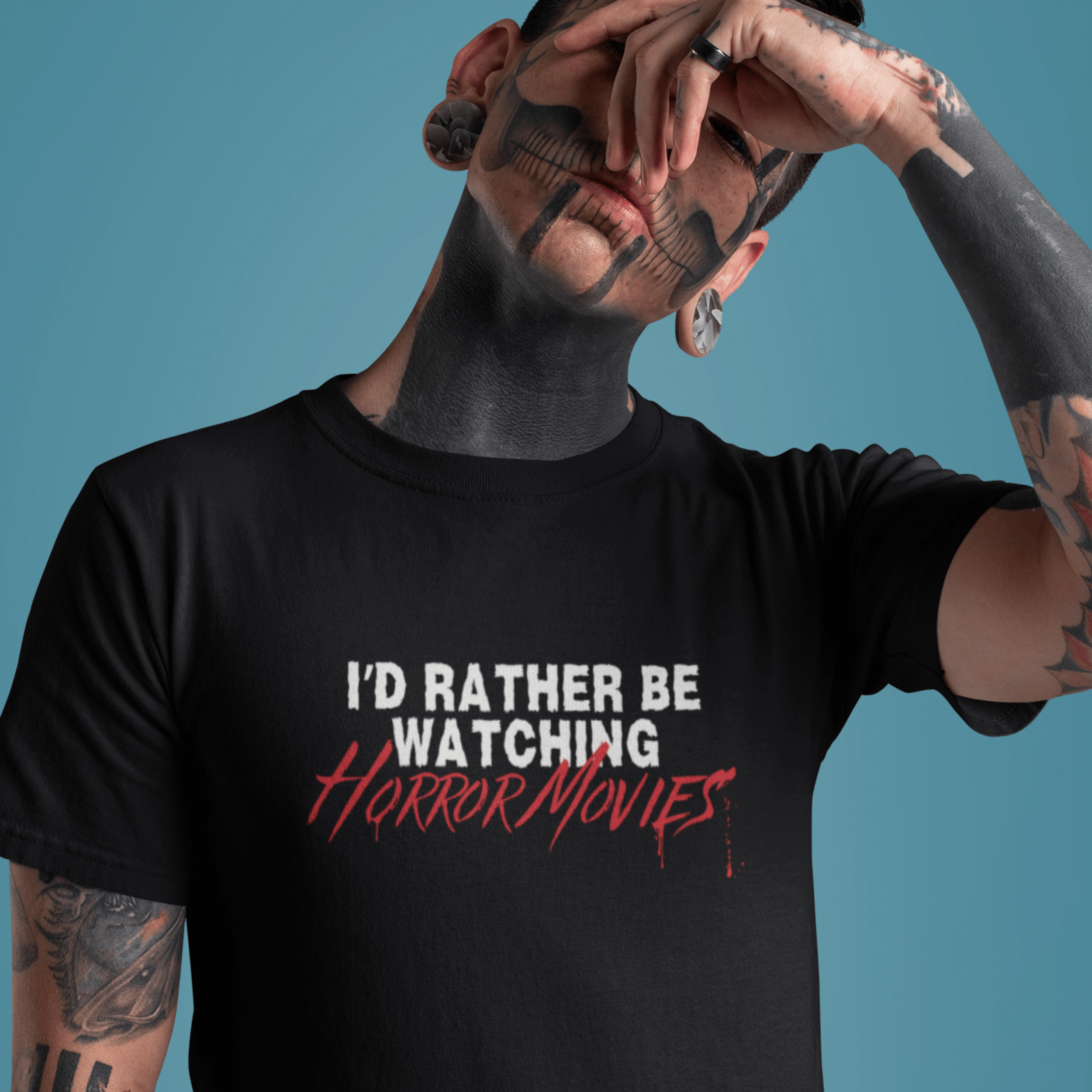 close up of man wearing horror movie t-shirt with text "I'd rather be watching horror movies"