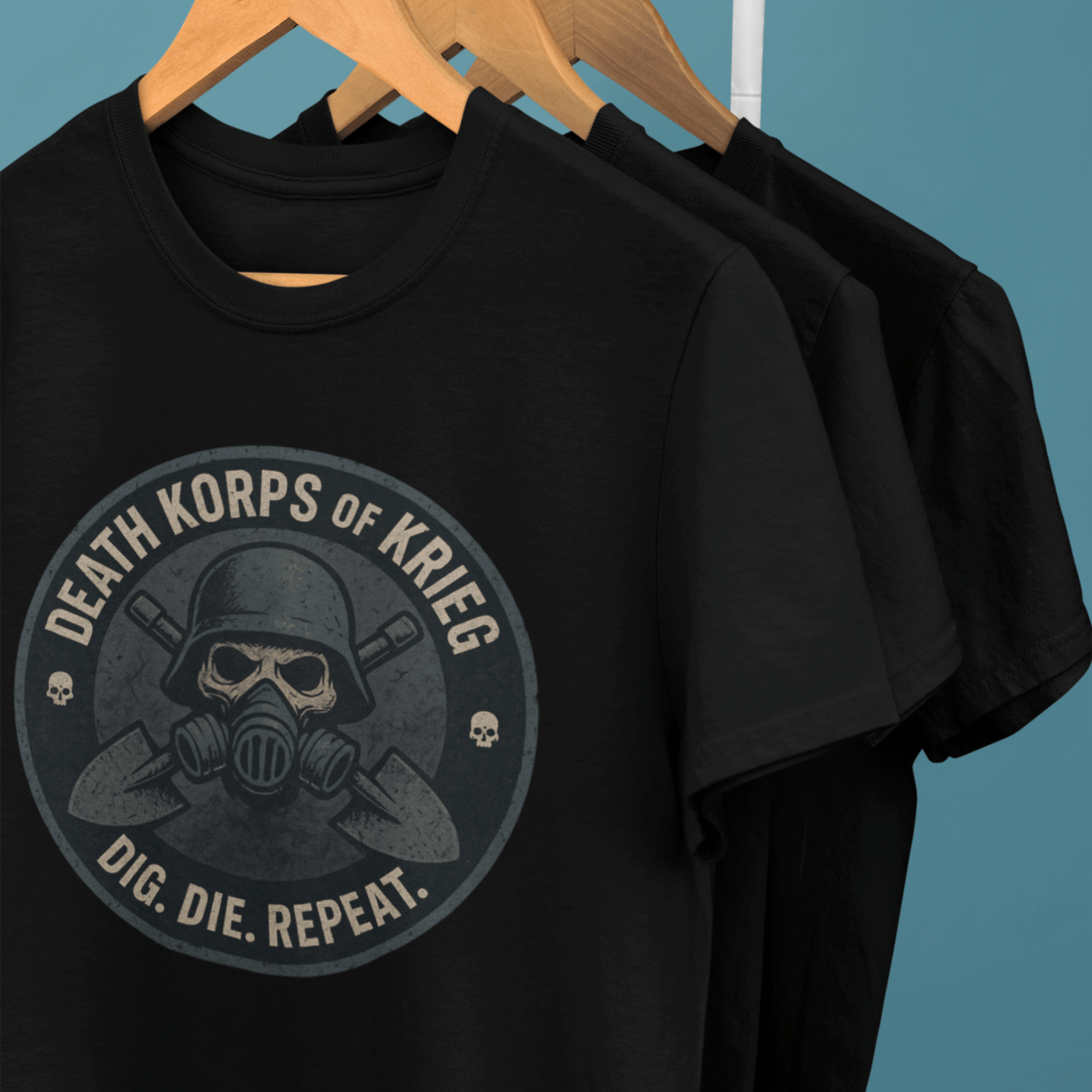 rack of Warhammer 40k death korps of krieg tshirts with skull and "dig die repeat" slogan